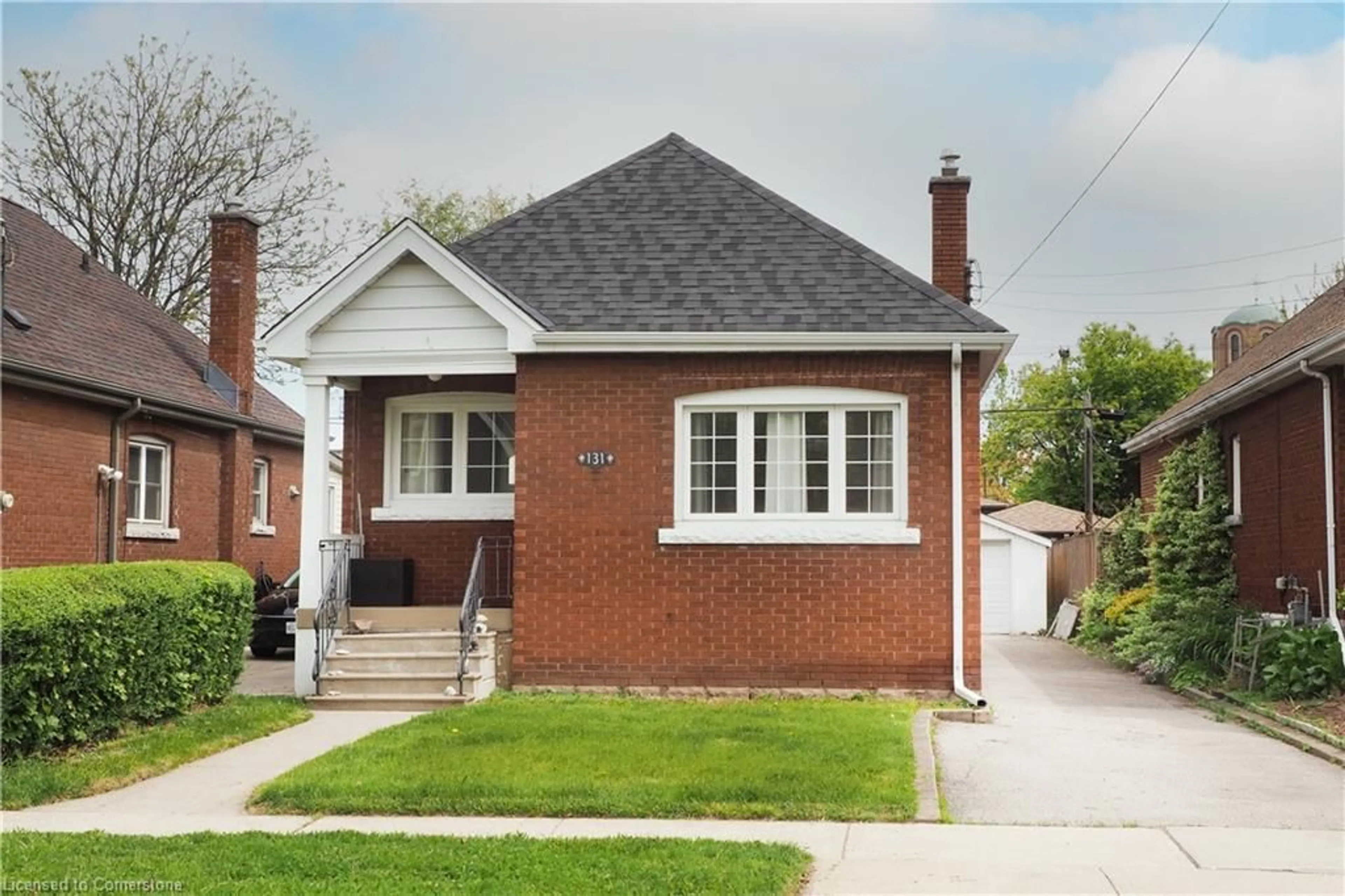 Home with brick exterior material, street for 131 Newlands Ave, Hamilton Ontario L8H 2T8