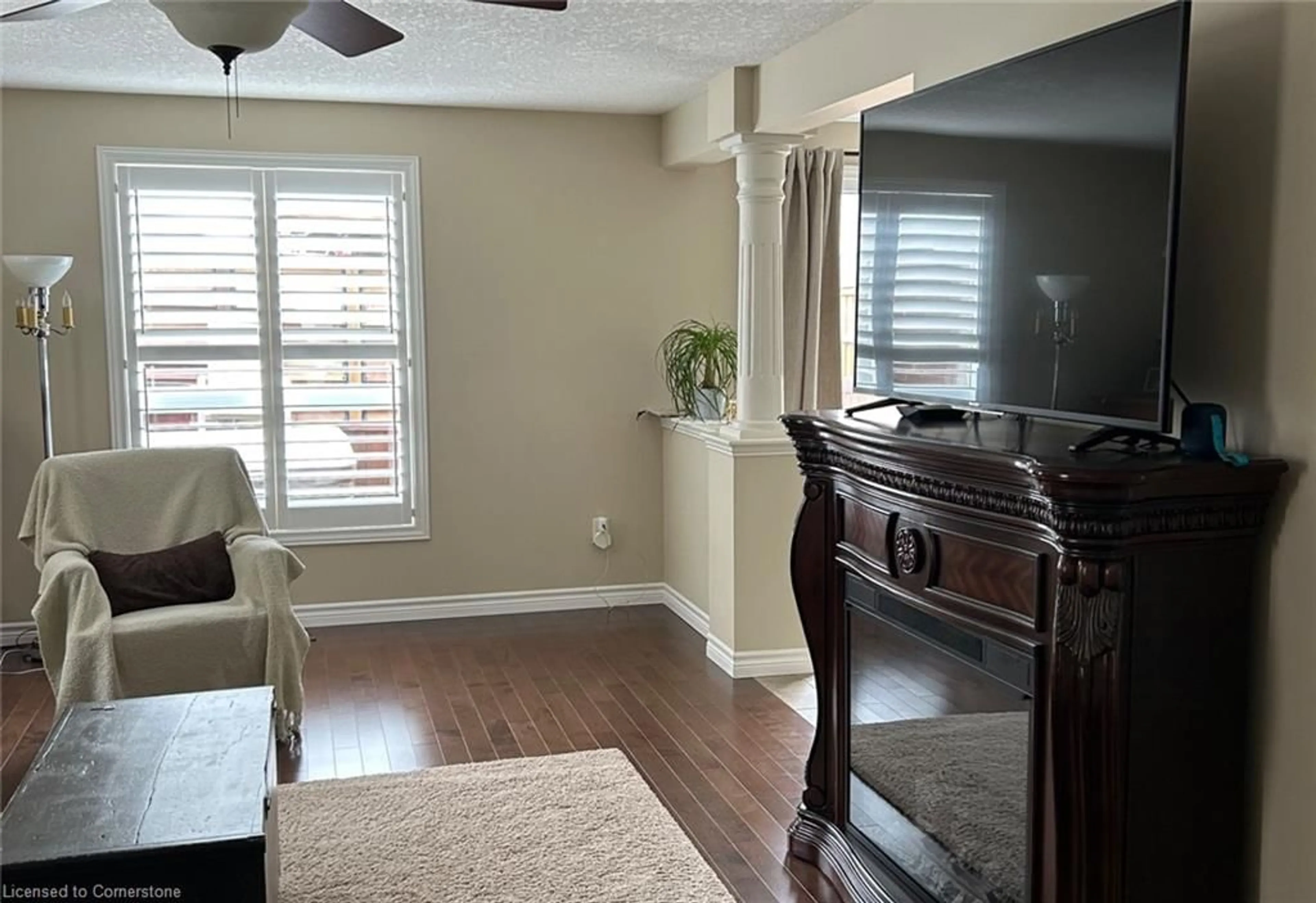 Living room with furniture, wood/laminate floor for 42 Brookmead St, Elmira Ontario N3B 3L8