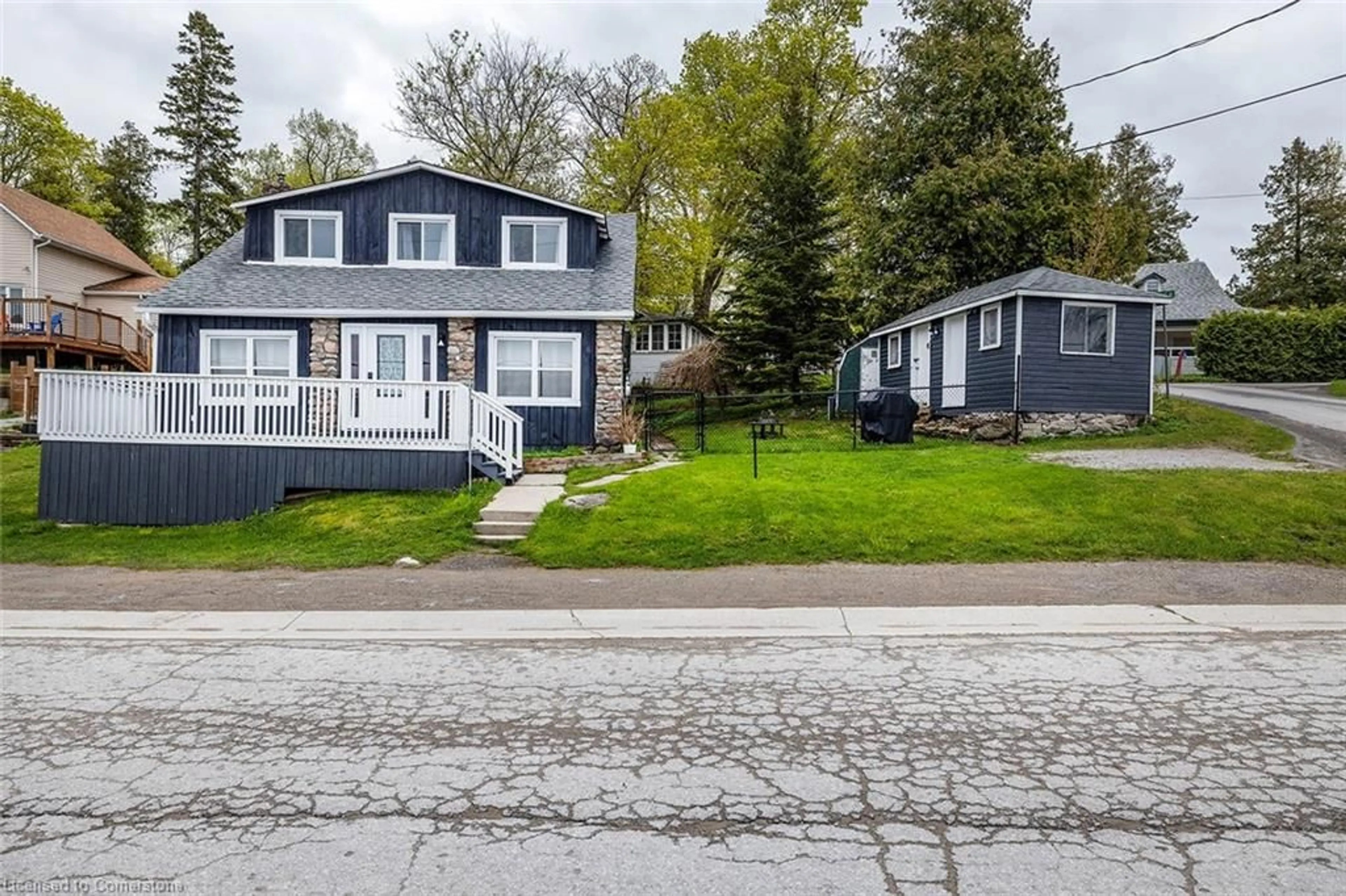 A pic from outside/outdoor area/front of a property/back of a property/a pic from drone, street for 111 Hazel St, Dunsford Ontario K0M 1L0