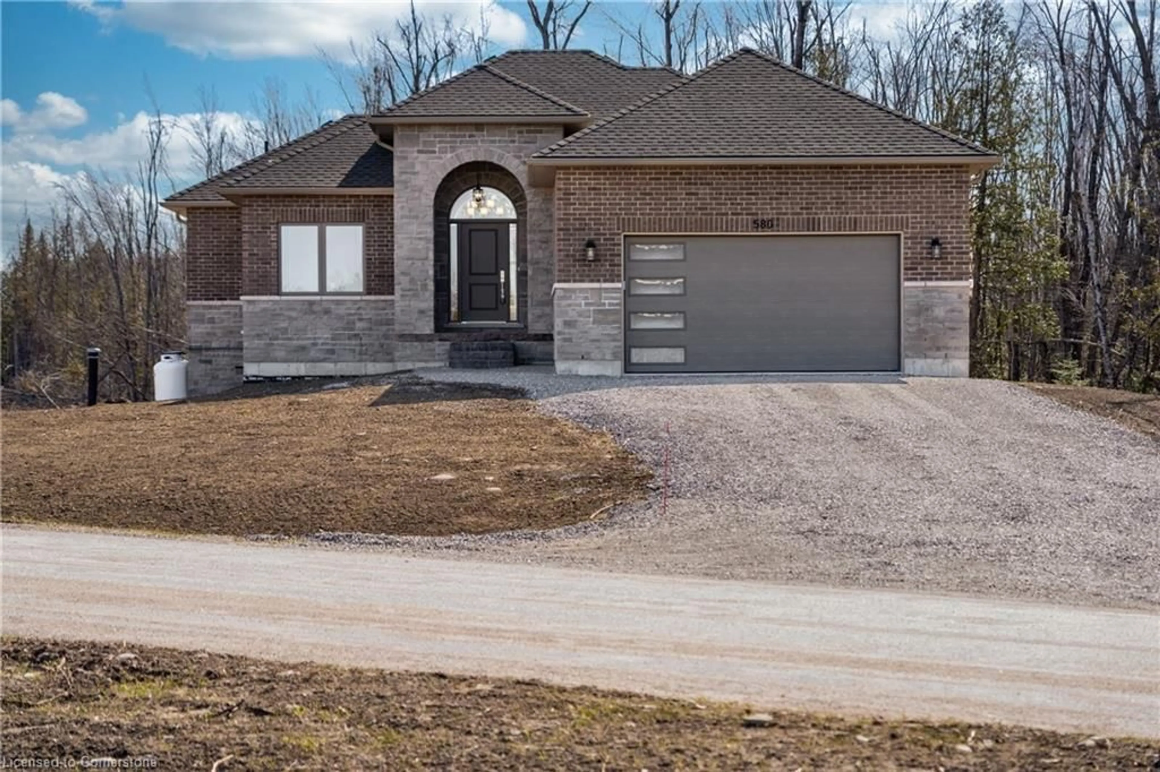 Home with brick exterior material, street for 580 Patterson Rd, Kawartha Lakes Ontario L0M 1N0