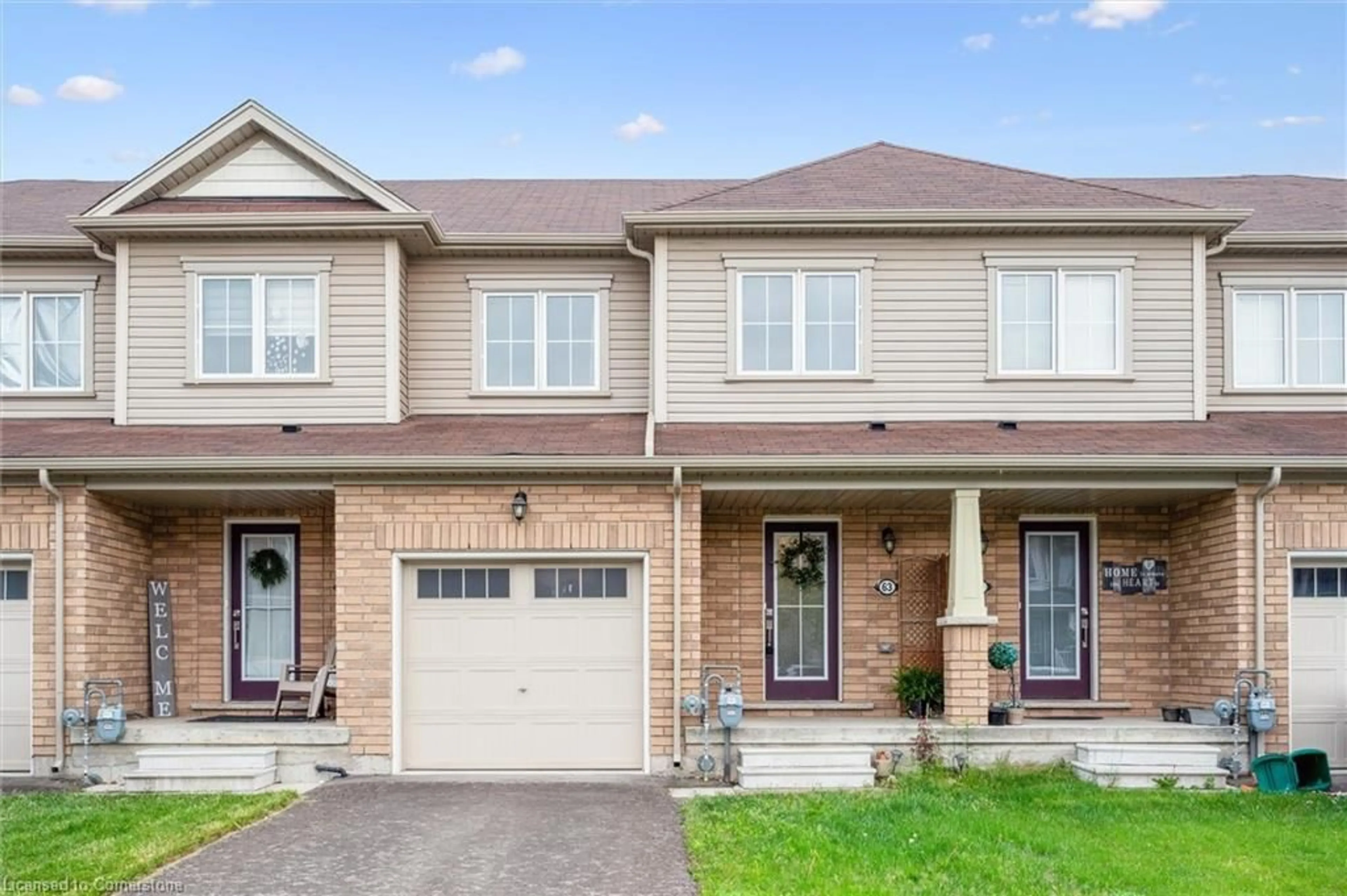 Home with brick exterior material, street for 63 Blacksmith Dr, Breslau Ontario N0B 1M0
