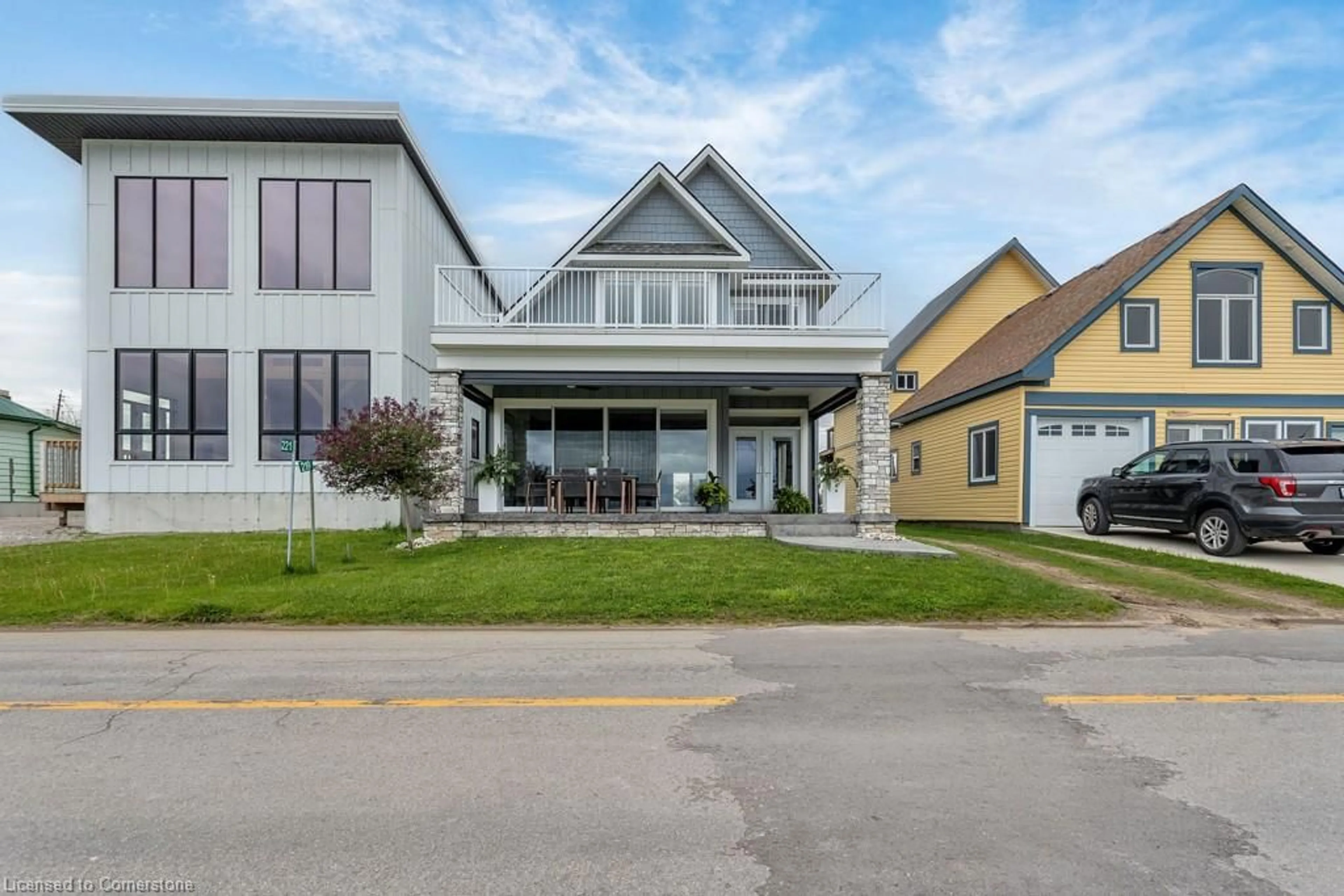 Home with vinyl exterior material, street for 219 Ordnance Ave, Turkey Point Ontario N0E 1T0