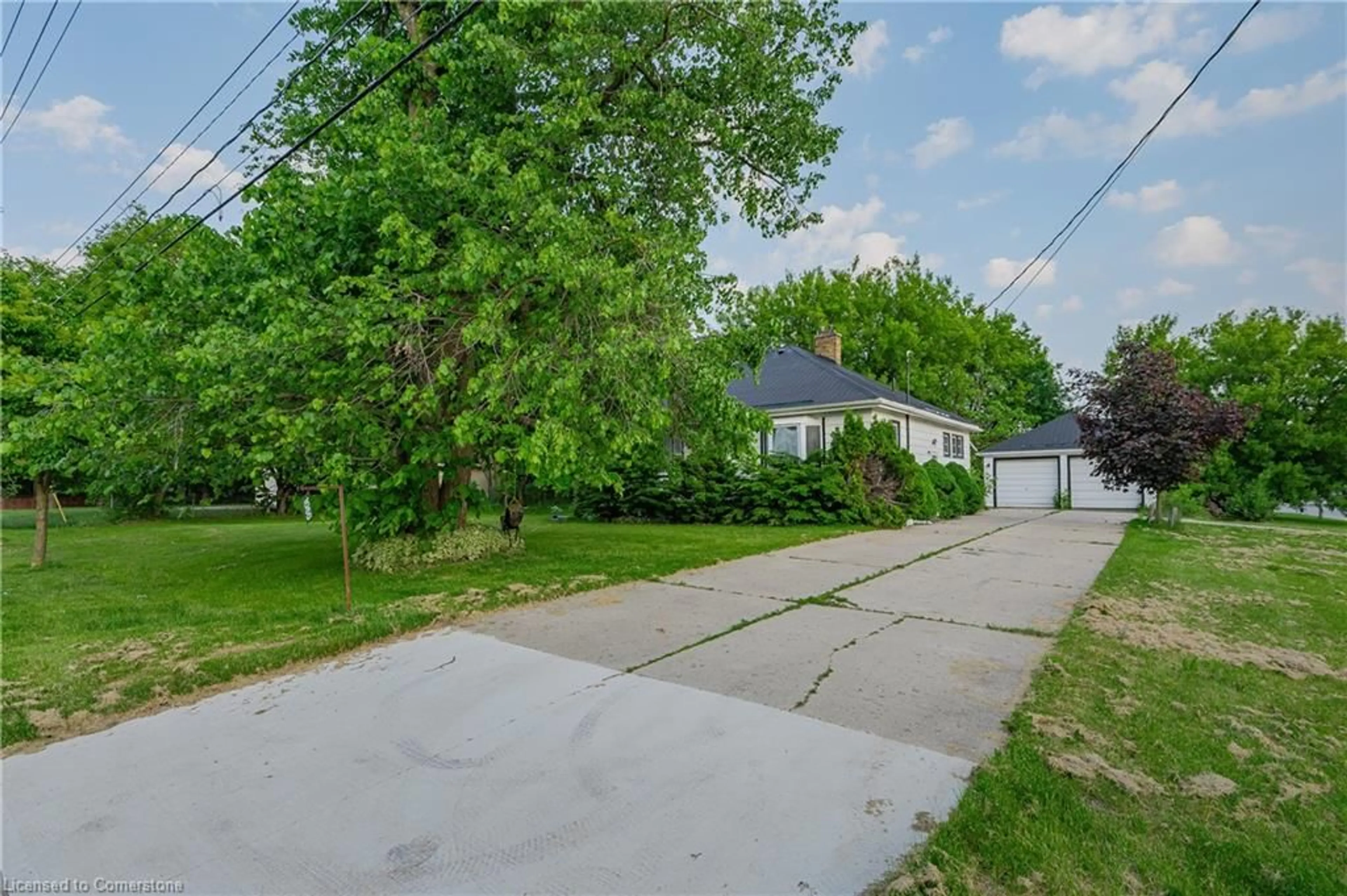 A pic from outside/outdoor area/front of a property/back of a property/a pic from drone, street for 1060 Queens Bush Rd, Wellesley Ontario N0B 2T0