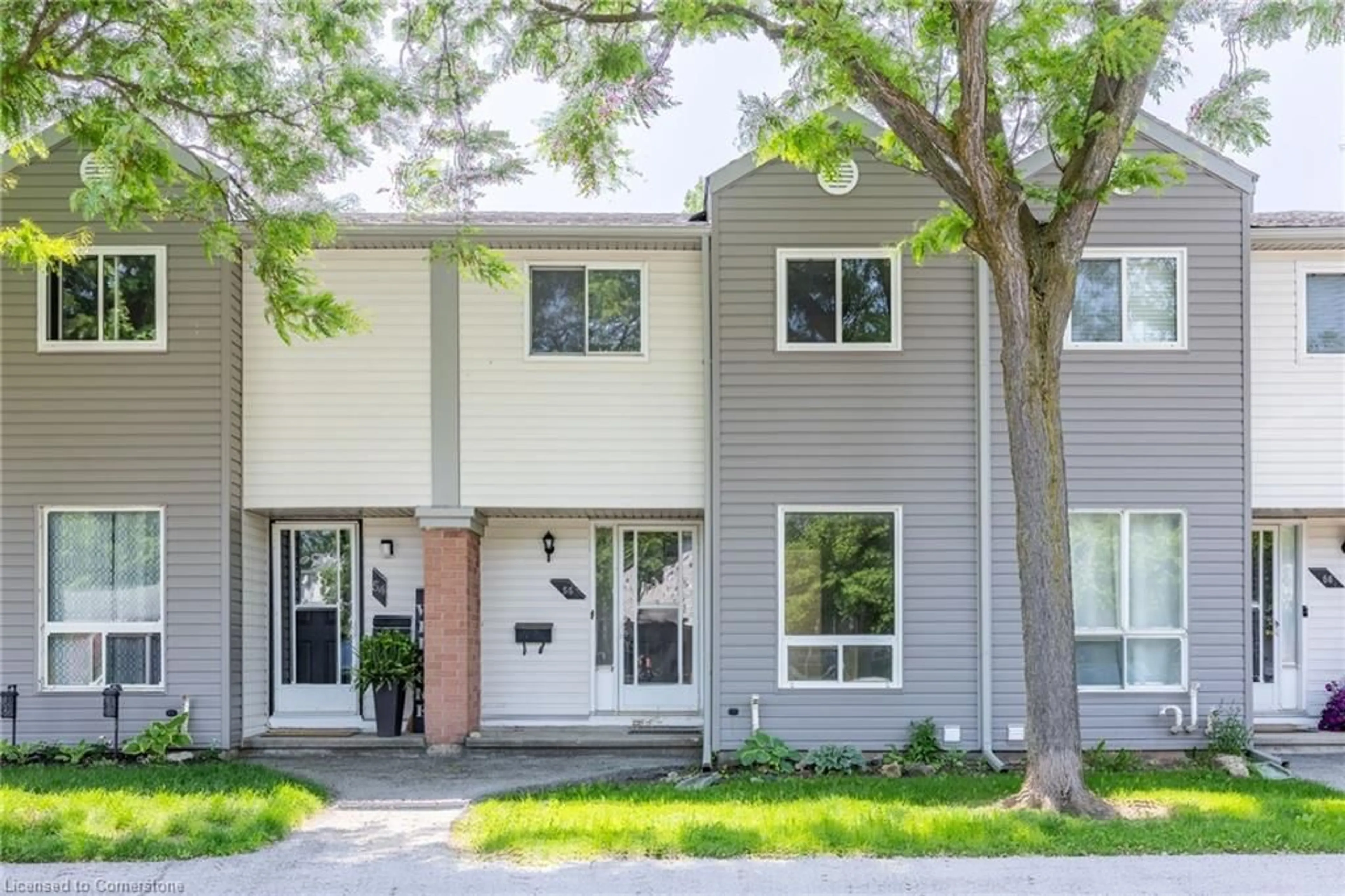 Home with vinyl exterior material, street for 40 Imperial Road North Rd #55, Guelph Ontario N1H 8B4