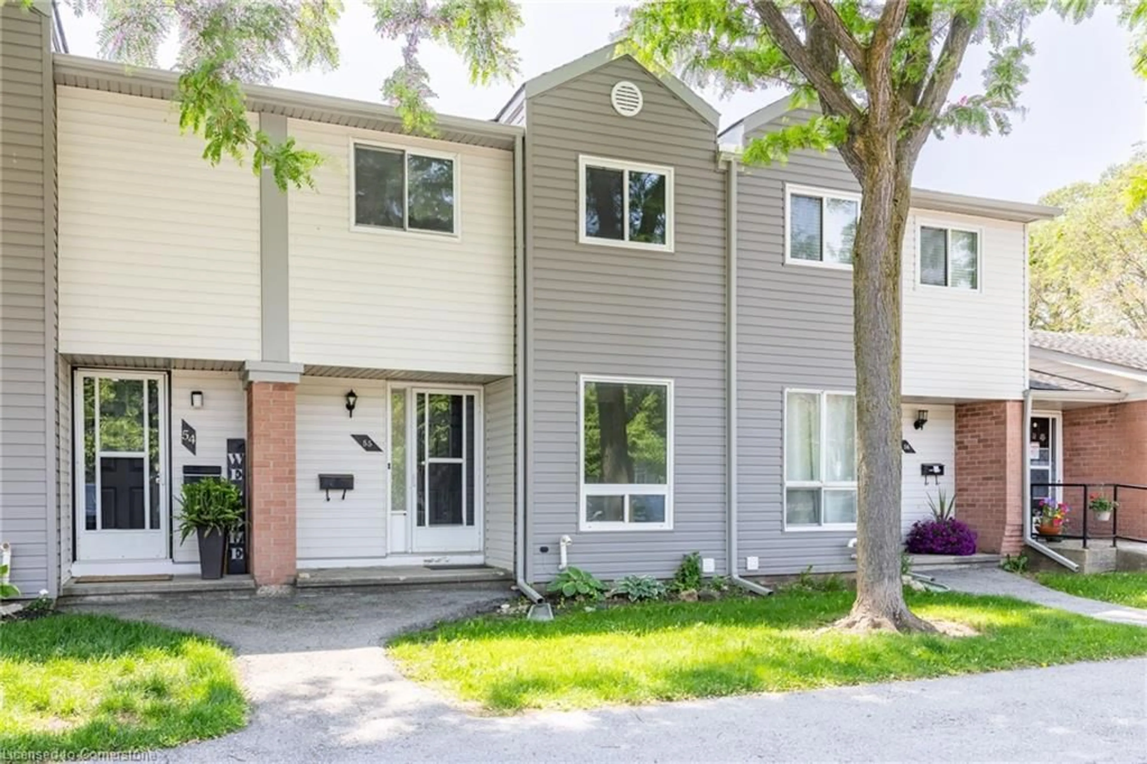 Home with vinyl exterior material, street for 40 Imperial Road North Rd #55, Guelph Ontario N1H 8B4