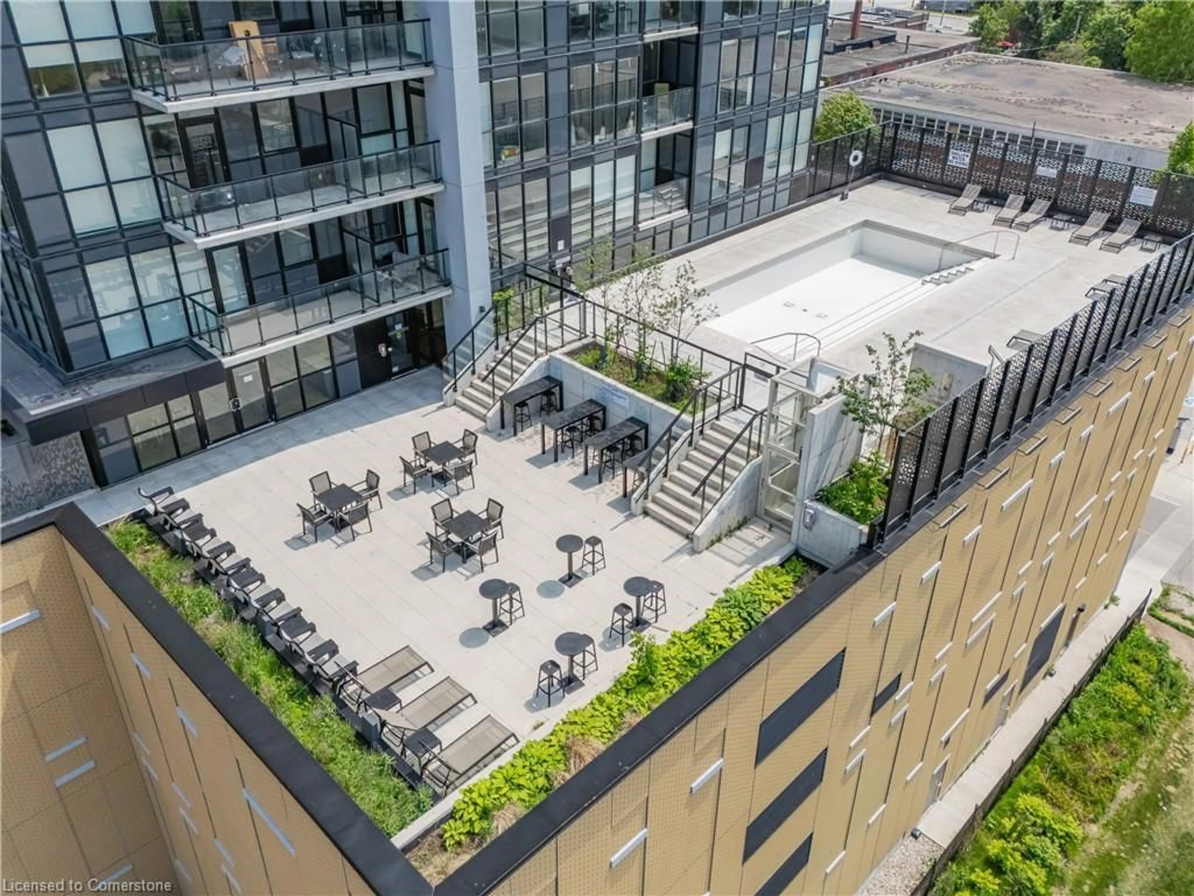 Patio, city buildings view from balcony for 108 Garment St #2305, Kitchener Ontario N2G 2B3