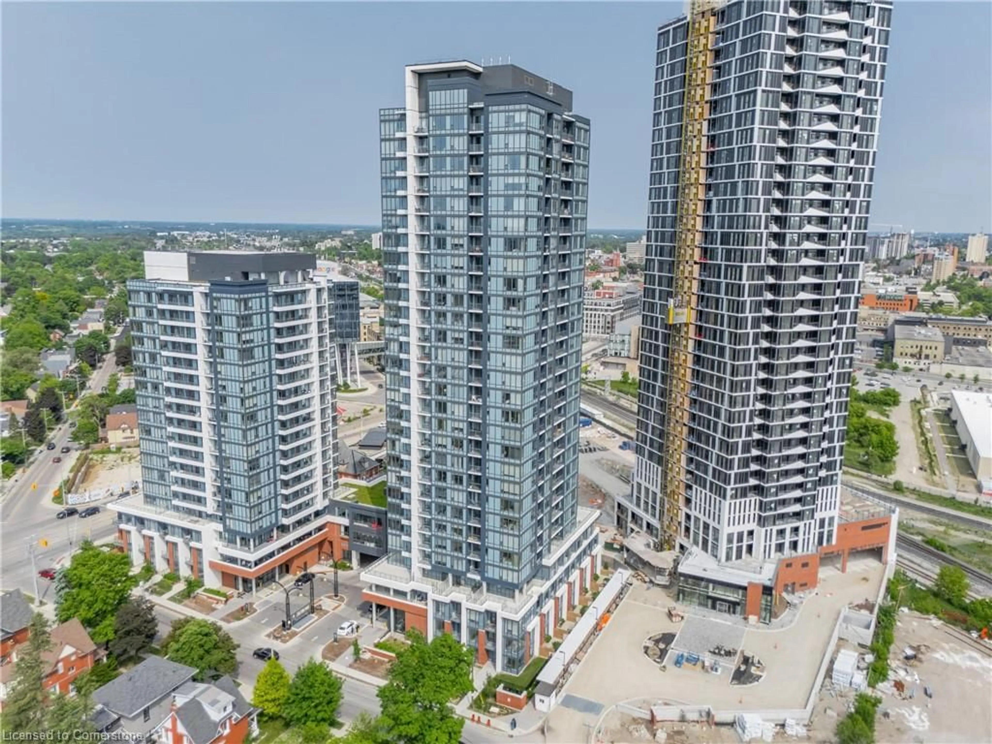 A pic from outside/outdoor area/front of a property/back of a property/a pic from drone, city buildings view from balcony for 15 Wellington St #309, Kitchener Ontario N2G 0E4