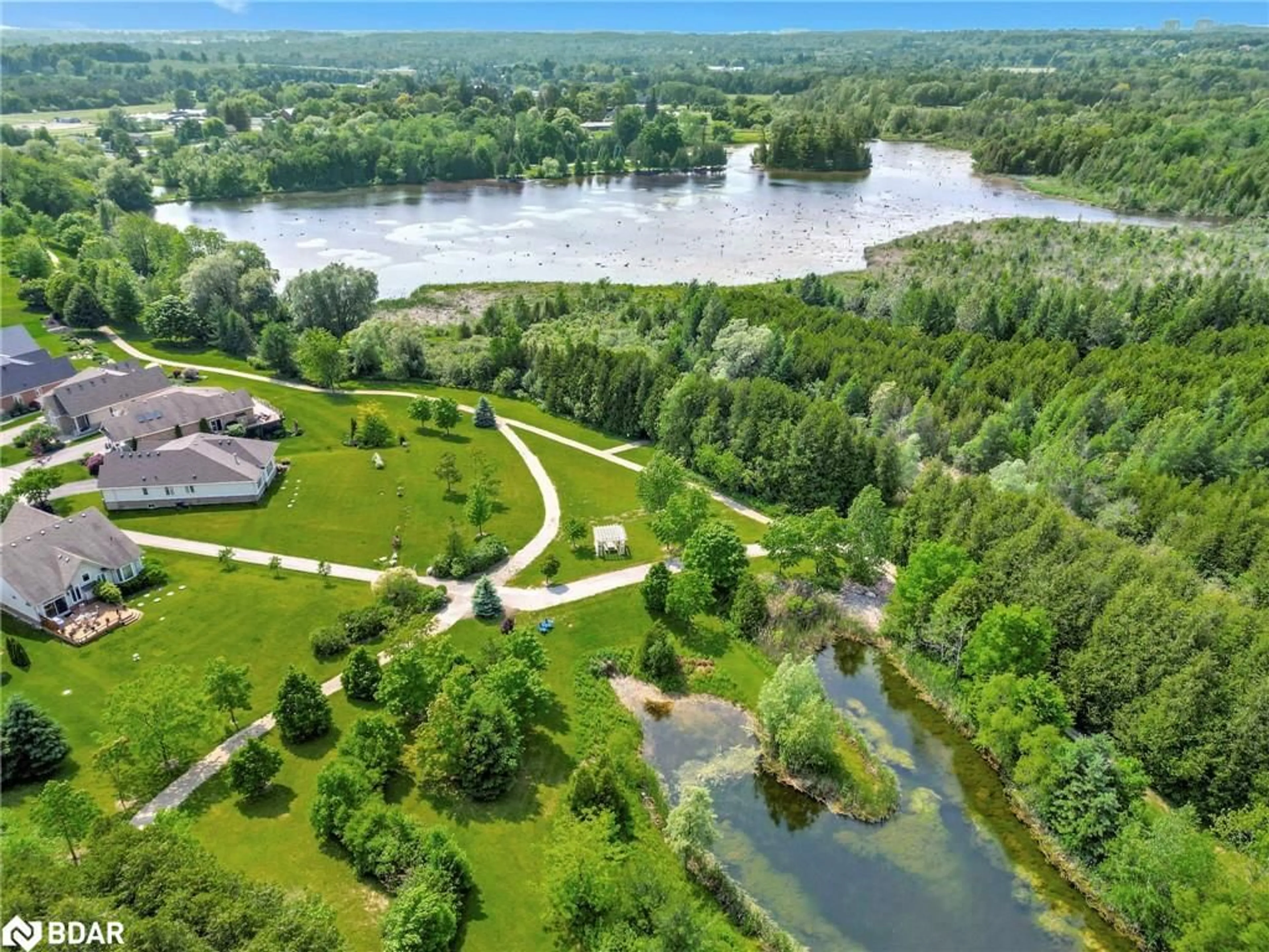 A pic from outside/outdoor area/front of a property/back of a property/a pic from drone, water/lake/river/ocean view for 114 Aberfoyle Mill Cres #26, Puslinch Ontario N0B 2J0