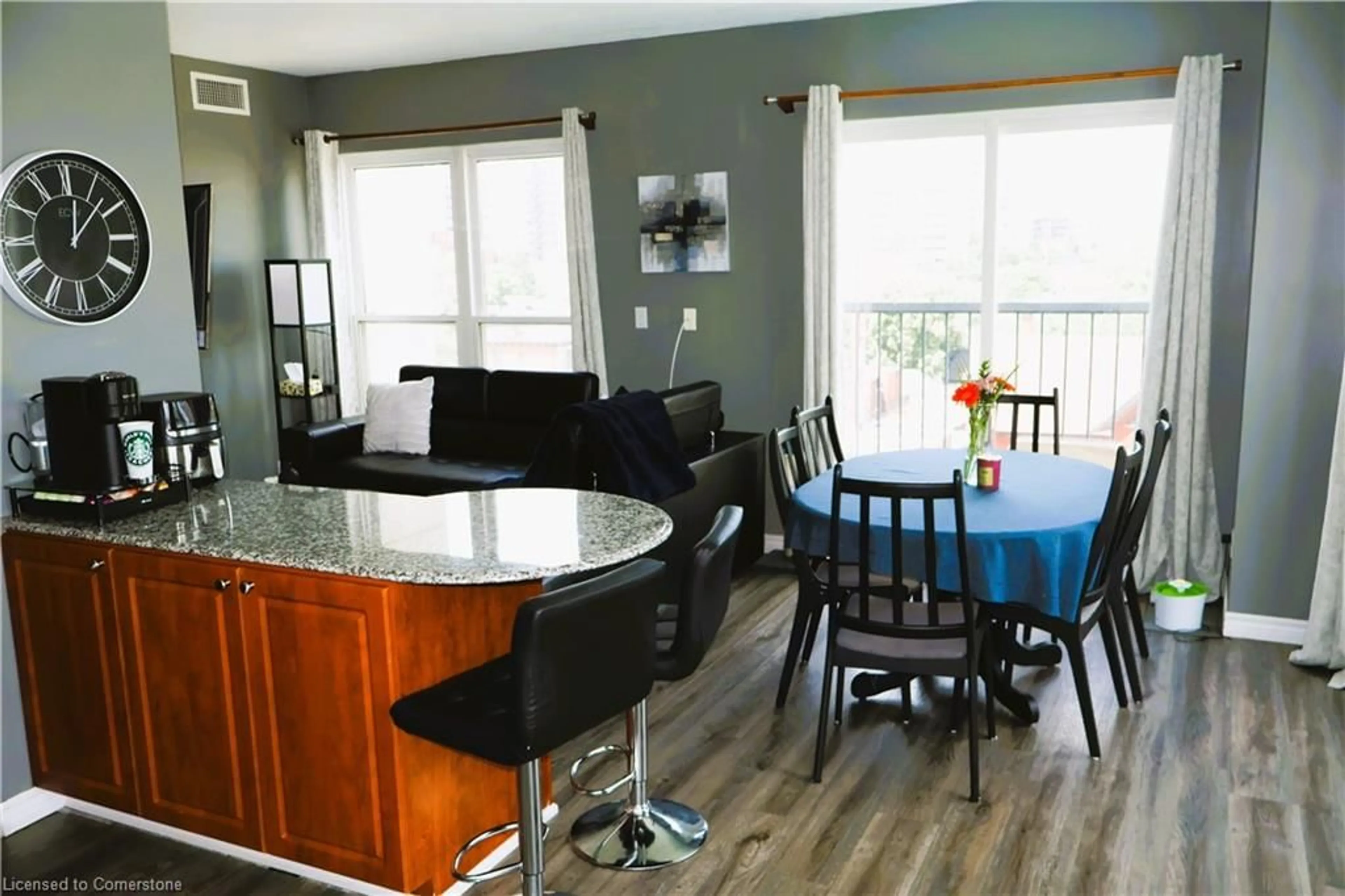 Open concept kitchen, wood/laminate floor for 135 James St #701, Hamilton Ontario L8P 2Z6