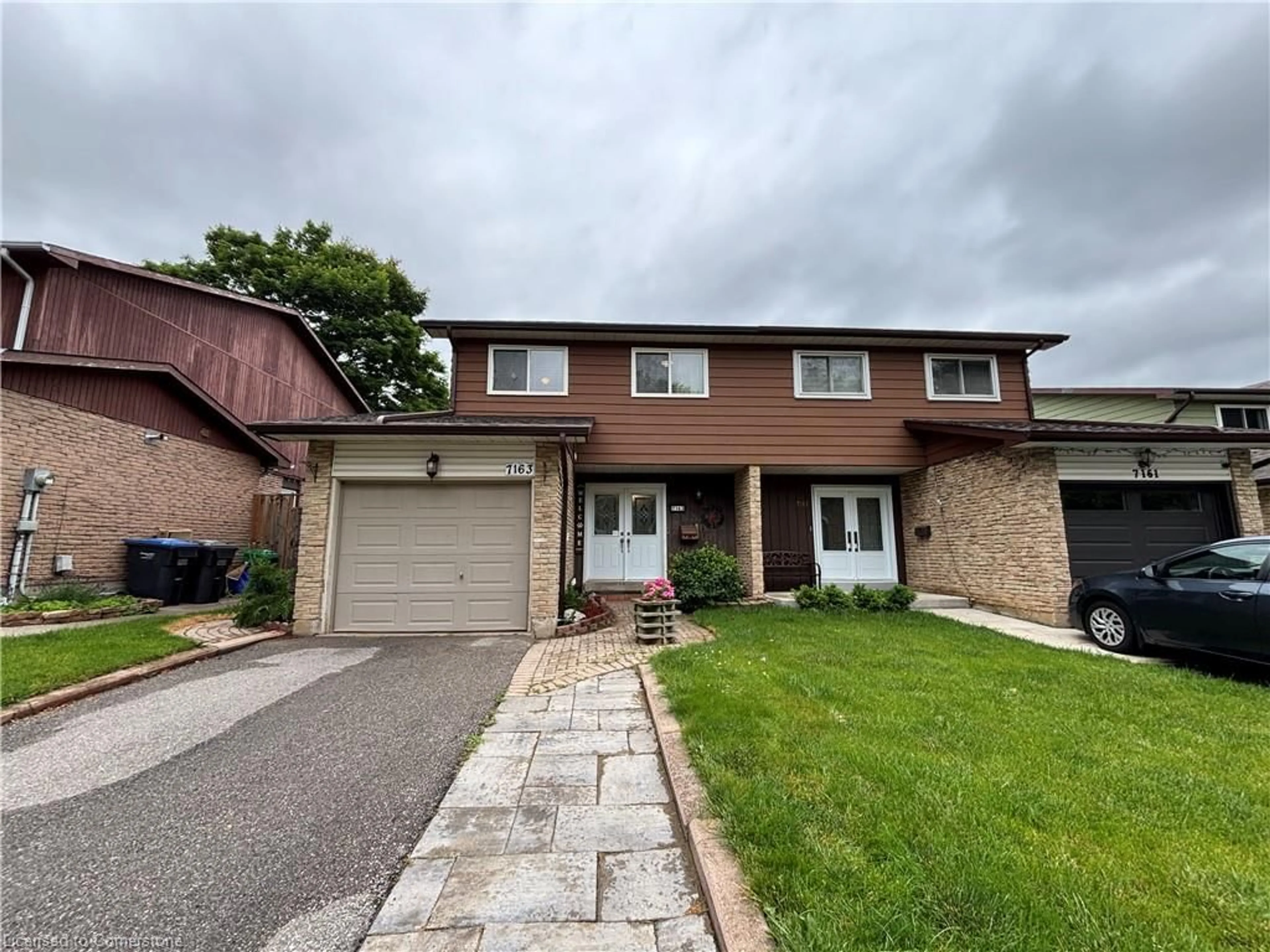 Home with brick exterior material, street for 7163 Fayette Cir, Mississauga Ontario L5N 1Y5