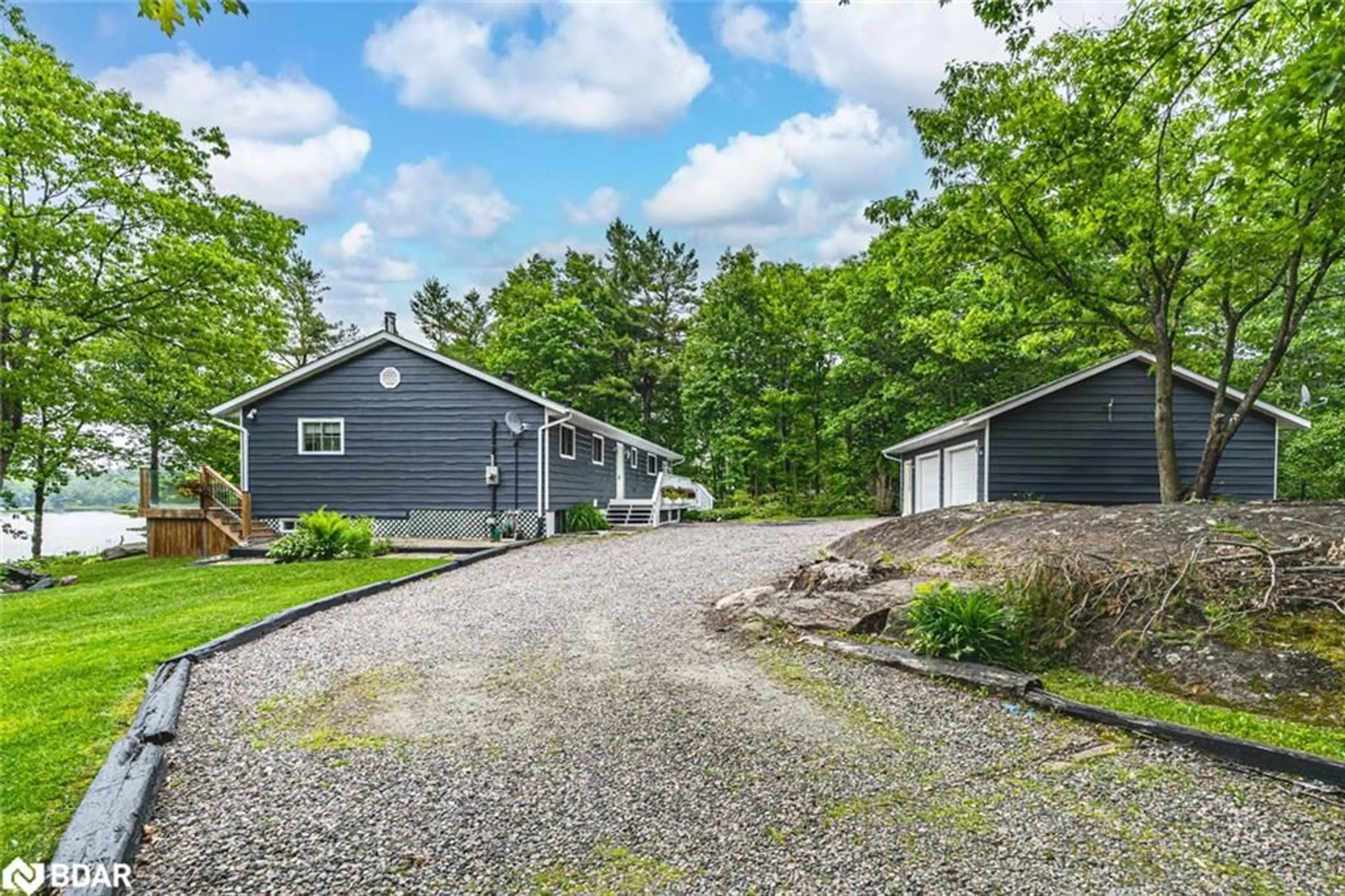 A pic from outside/outdoor area/front of a property/back of a property/a pic from drone, unknown for 1008 Cove Rd, Gravenhurst Ontario P0E 1G0