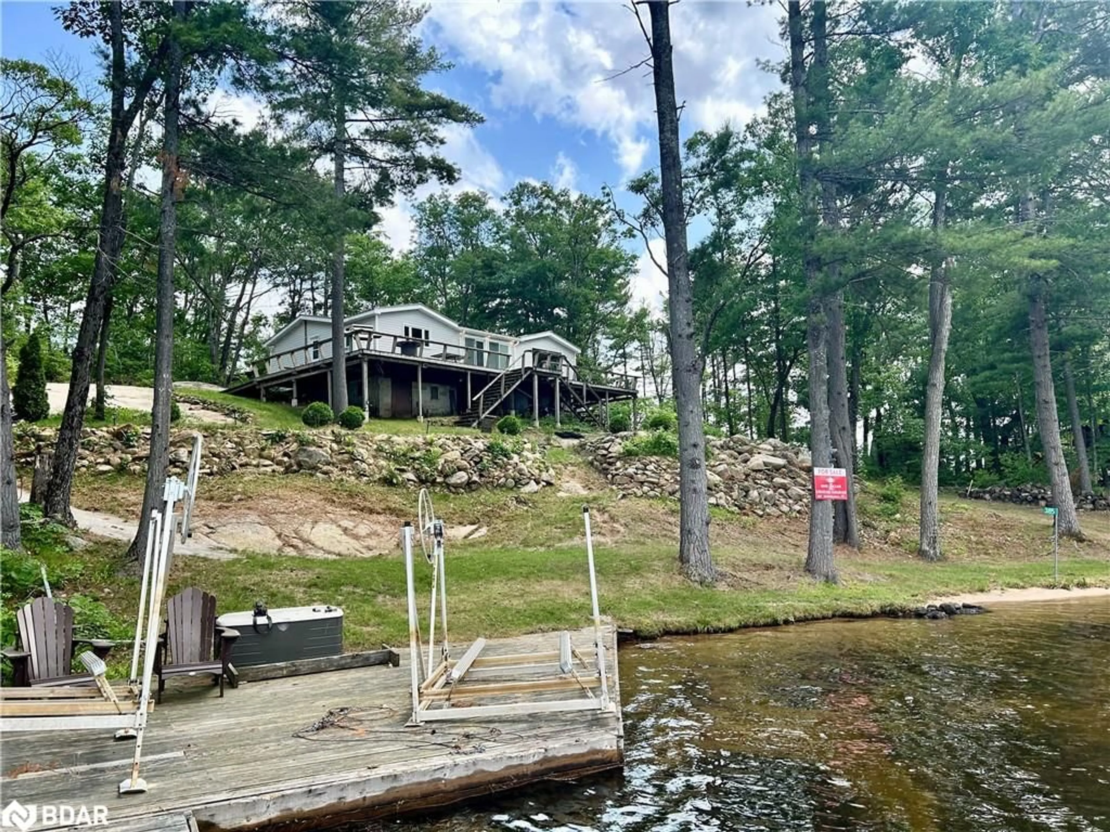 A pic from outside/outdoor area/front of a property/back of a property/a pic from drone, water/lake/river/ocean view for 385 Island 38, Havelock Ontario K0L 2H0