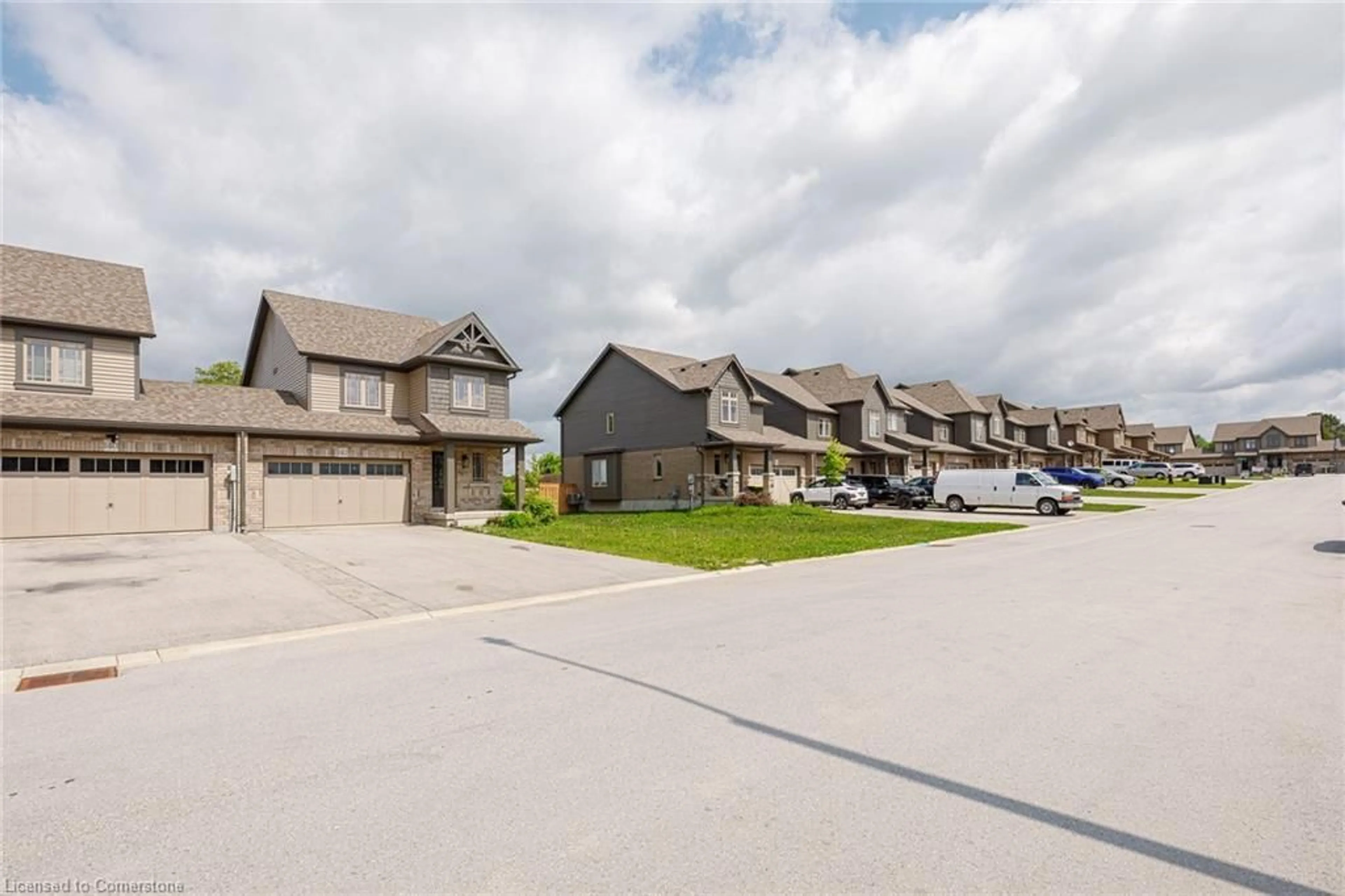 A pic from outside/outdoor area/front of a property/back of a property/a pic from drone, street for 142 Stonebrook Way, Markdale Ontario N0C 1H0