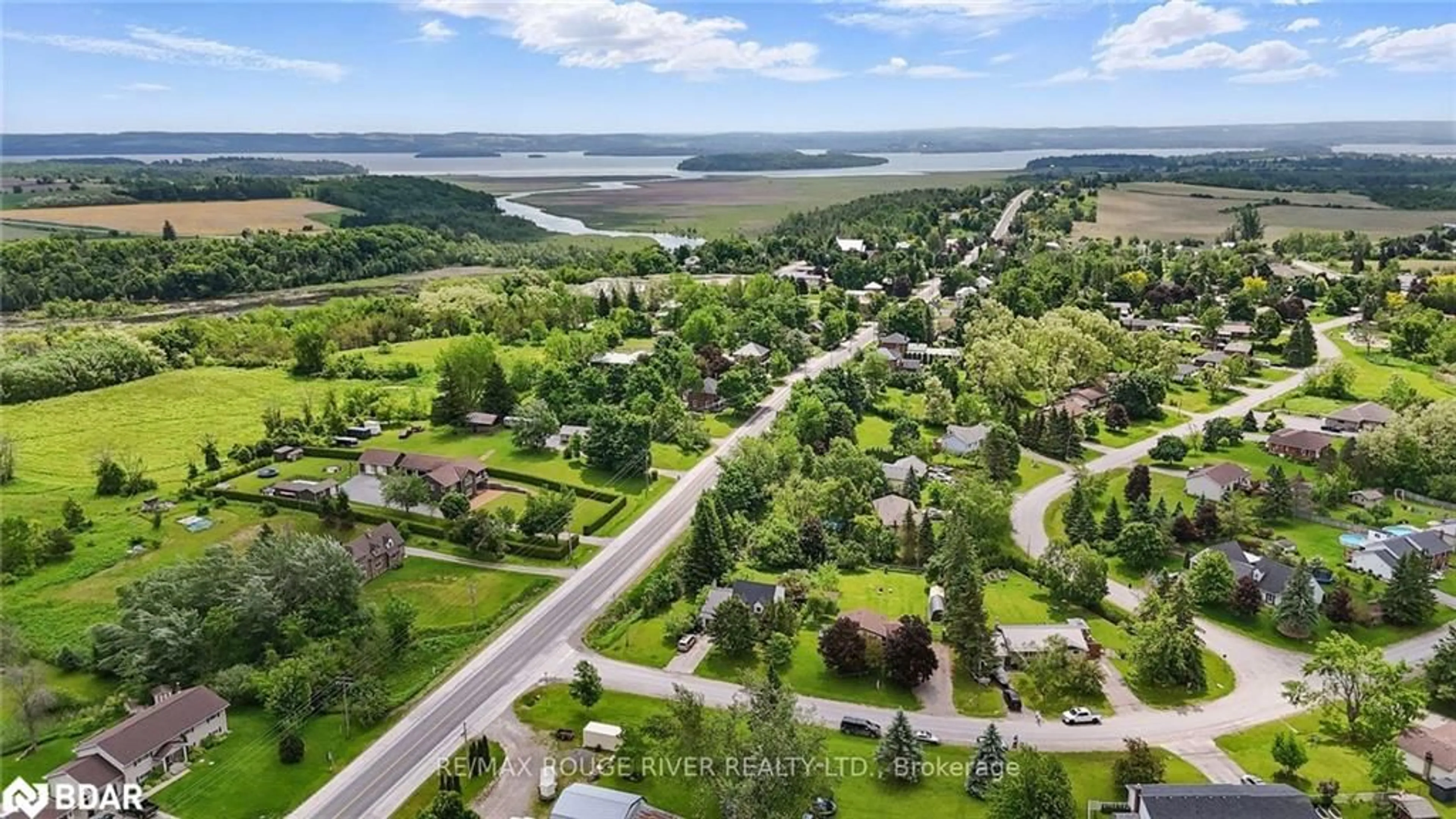 A pic from outside/outdoor area/front of a property/back of a property/a pic from drone, water/lake/river/ocean view for 19 Edwards Dr, Keene Ontario K0L 2G0