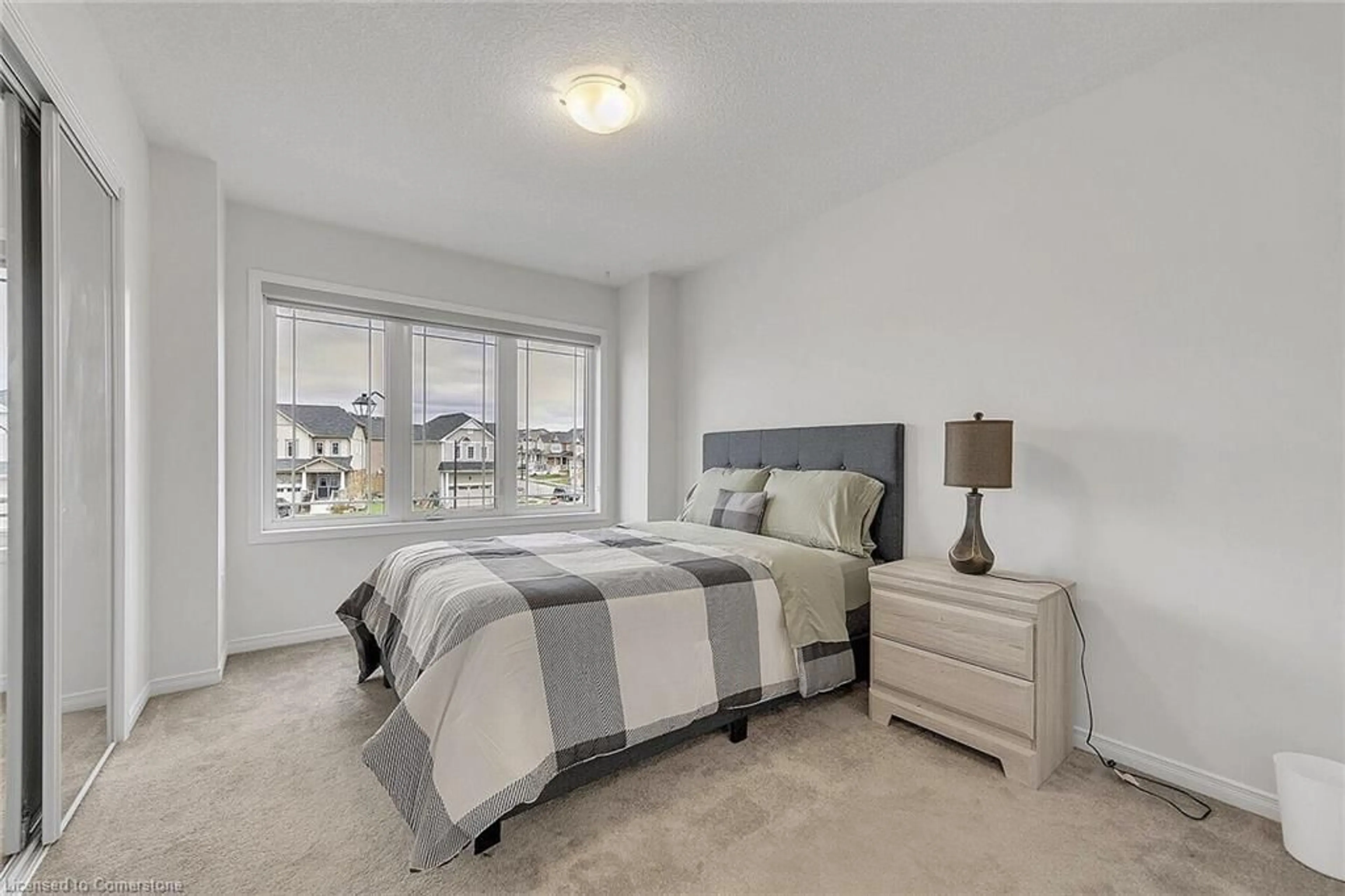 Bedroom with bed, carpet floor for 246 Dolman St, Woolwich Ontario N0B 1M0