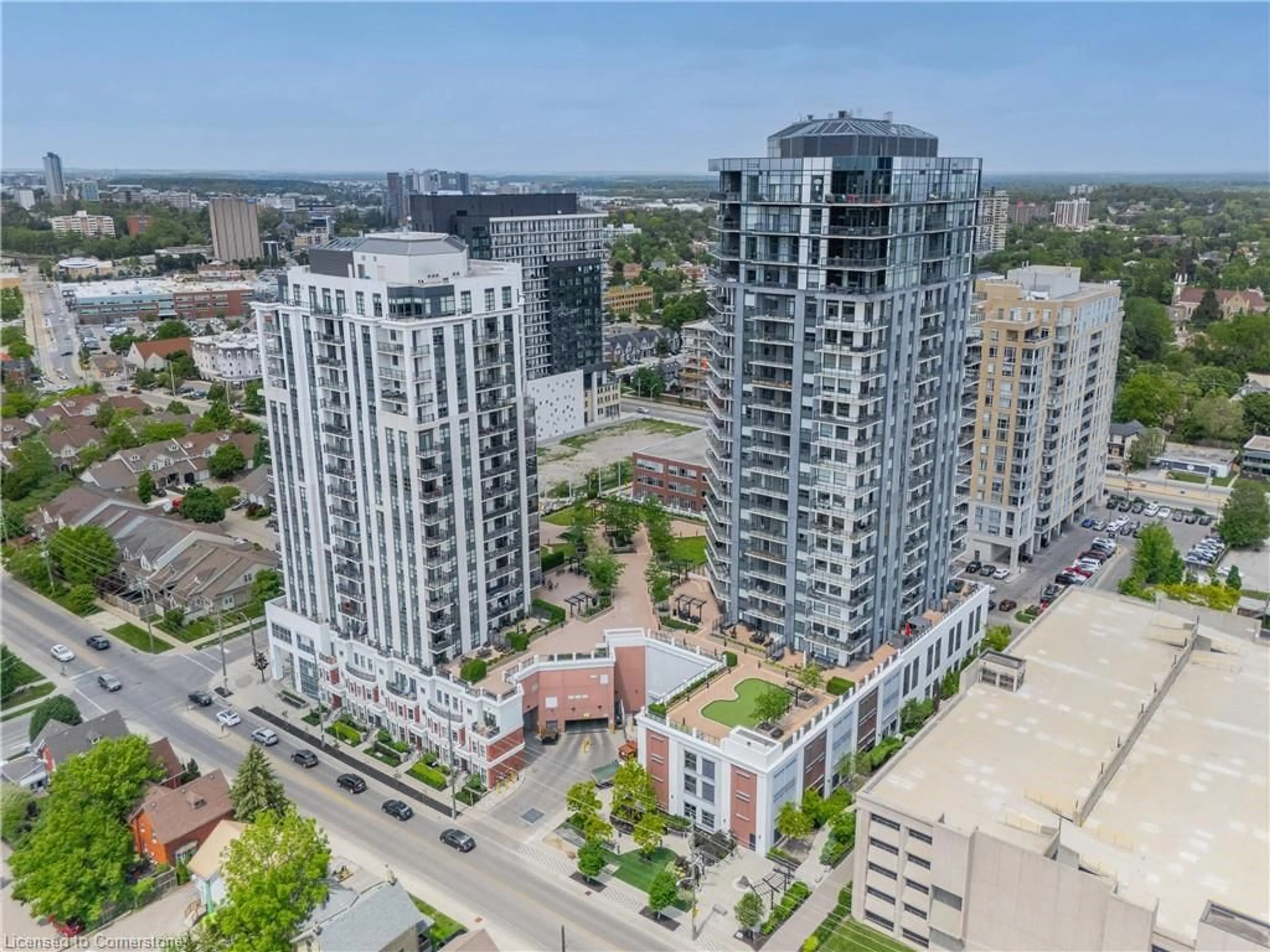 A pic from outside/outdoor area/front of a property/back of a property/a pic from drone, city buildings view from balcony for 155 Caroline St #1411, Waterloo Ontario N2L 0J8