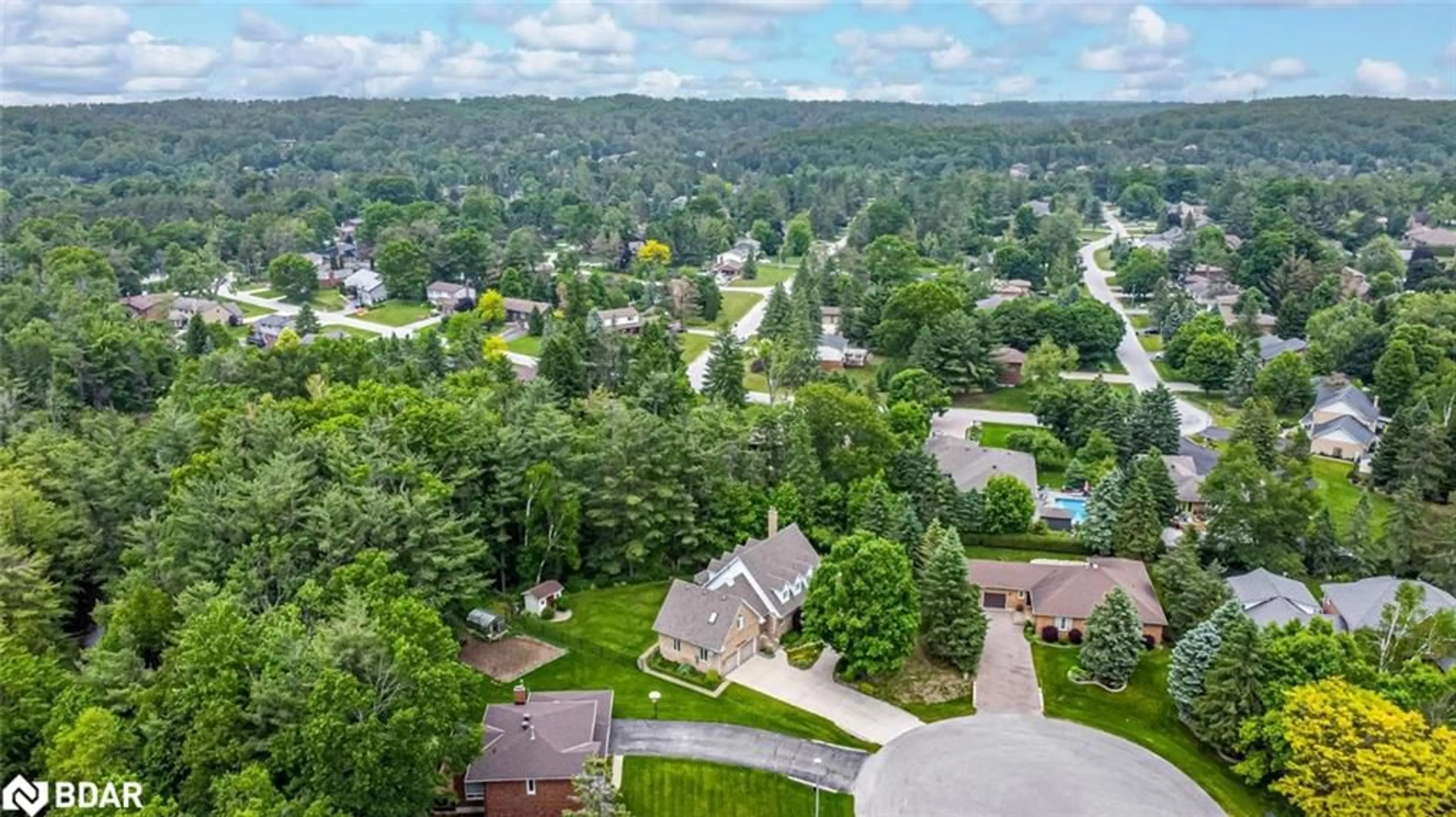 A pic from outside/outdoor area/front of a property/back of a property/a pic from drone, unknown for 24 Willow Bay Dr, Midhurst Ontario L9X 0R2