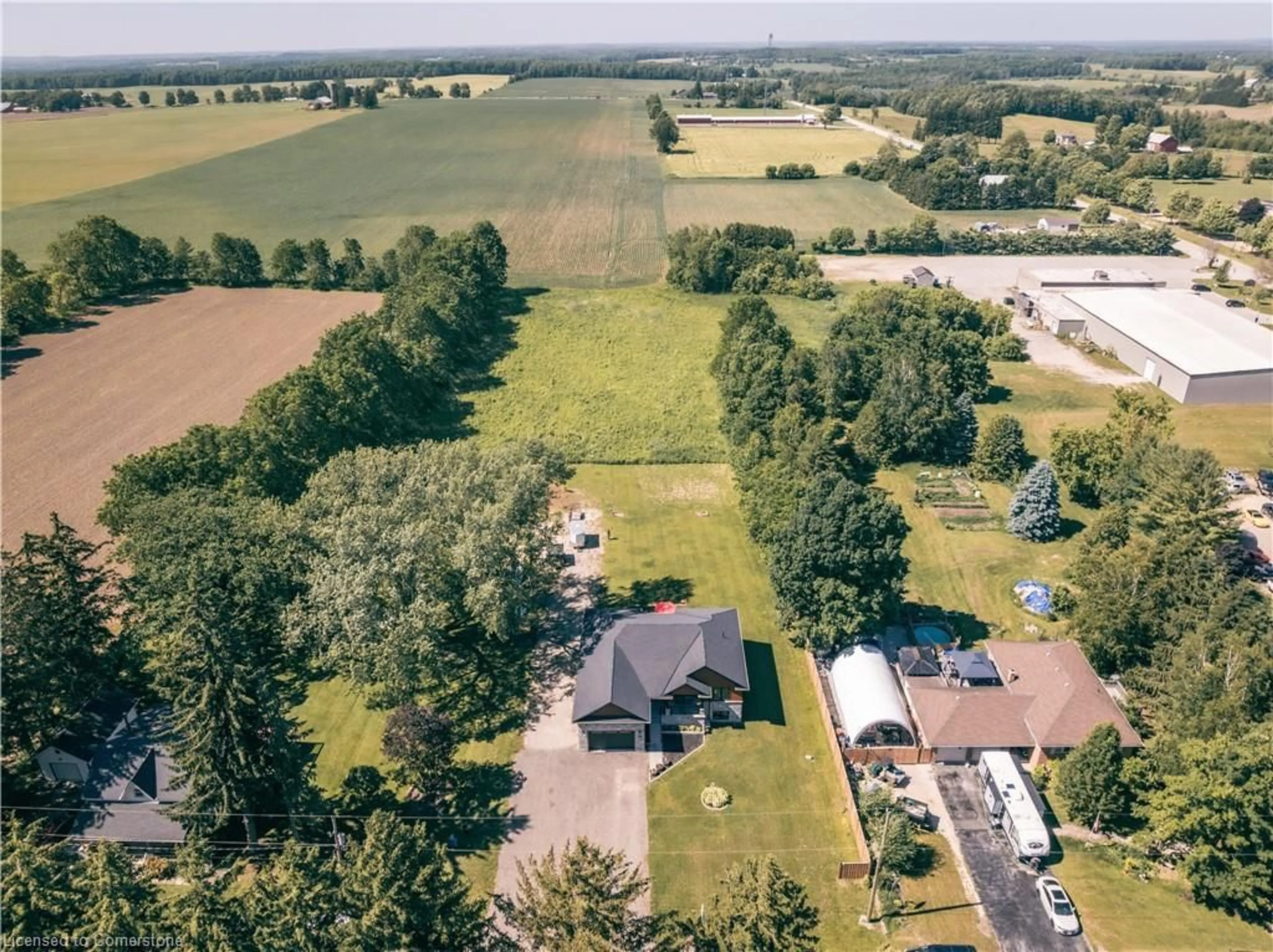 A pic from outside/outdoor area/front of a property/back of a property/a pic from drone, unknown for 1020 Victoria St, Ayton Ontario N0G 1C0