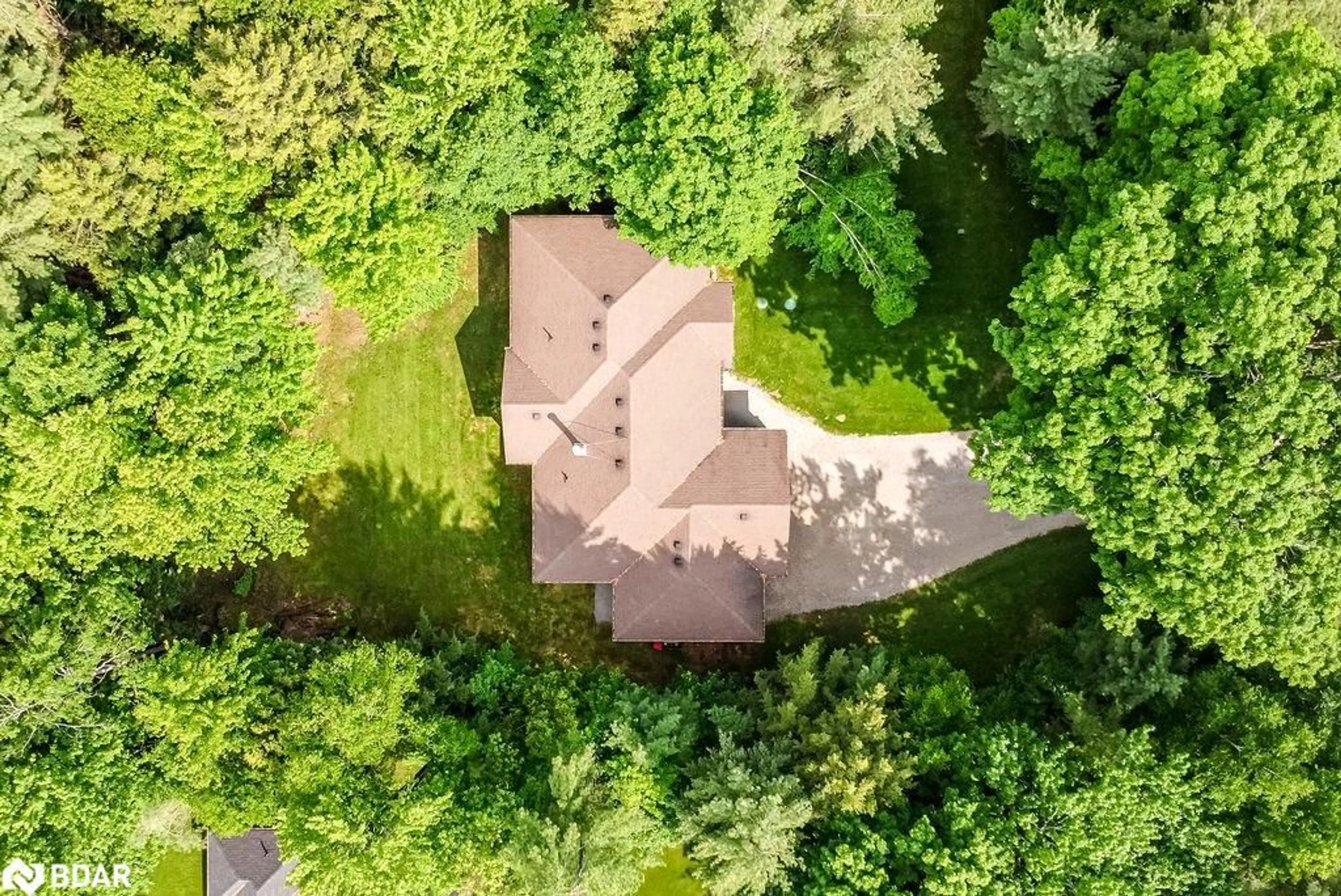 A pic from outside/outdoor area/front of a property/back of a property/a pic from drone, forest/trees view for 22 Marni Lane, Phelpston Ontario L0L 2K0