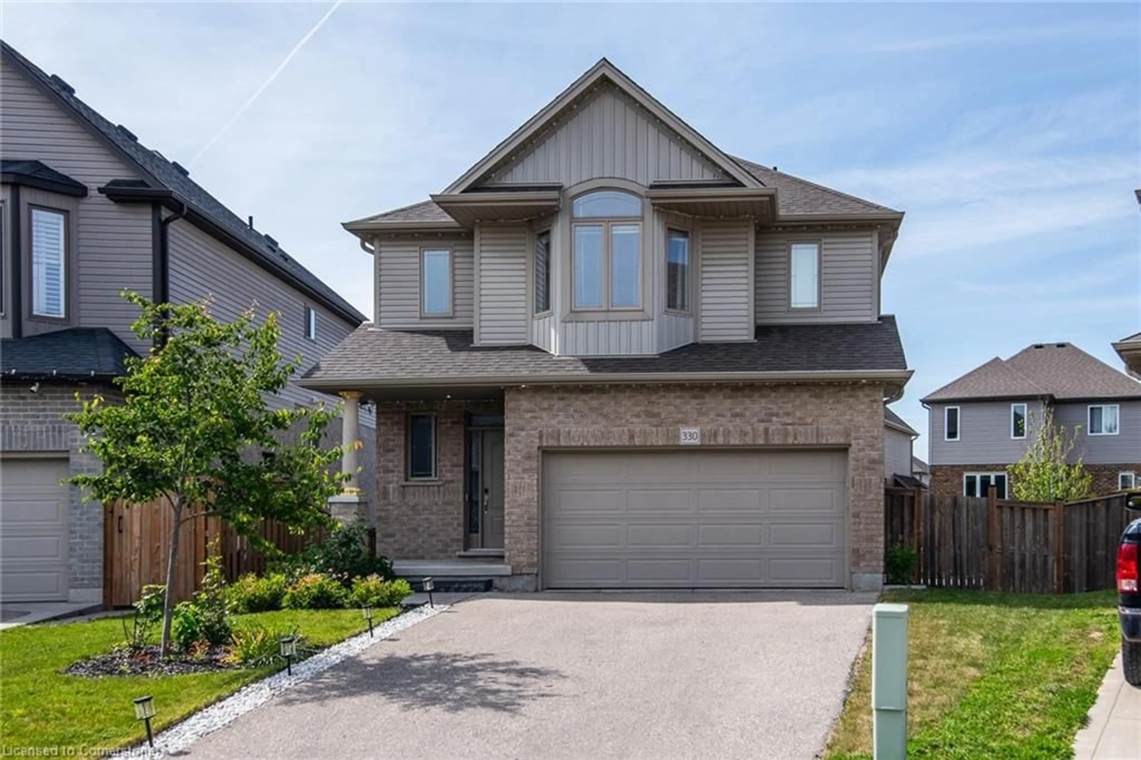 Home with brick exterior material, street for 330 Thornhill Pl, Waterloo Ontario N2T 0A9