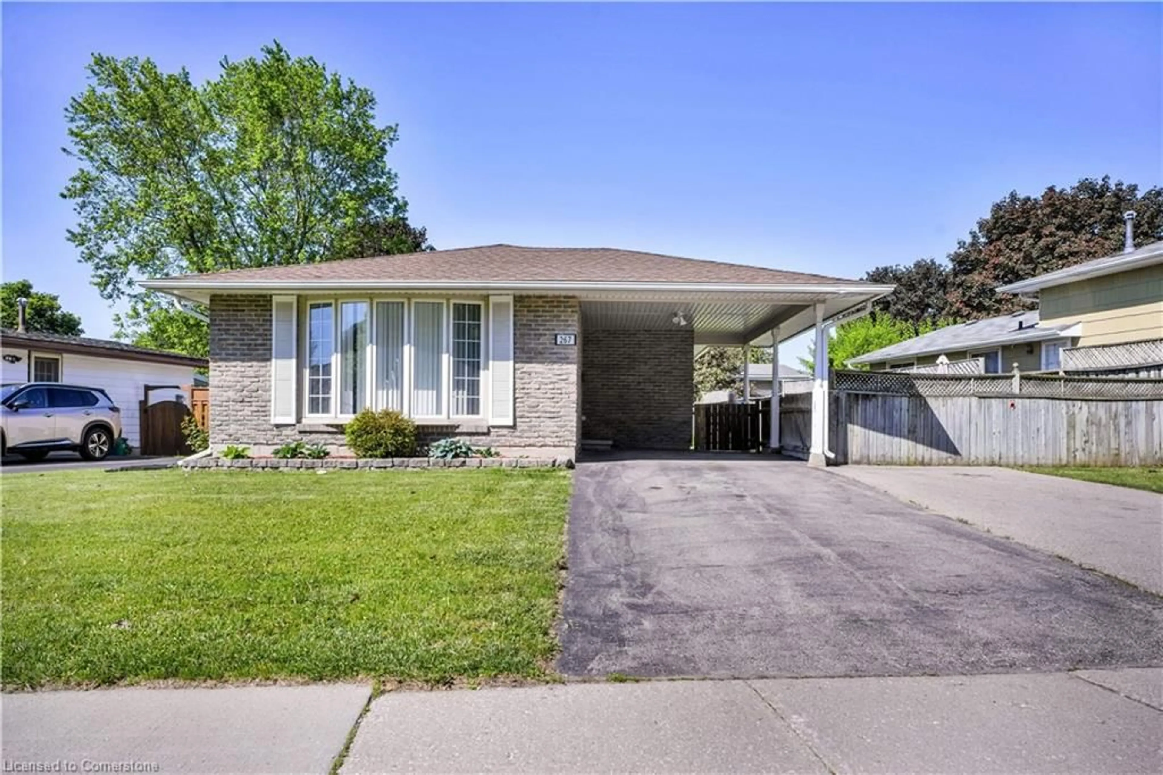 Home with brick exterior material, street for 267 Kingswood Dr, Kitchener Ontario N2E 1S1