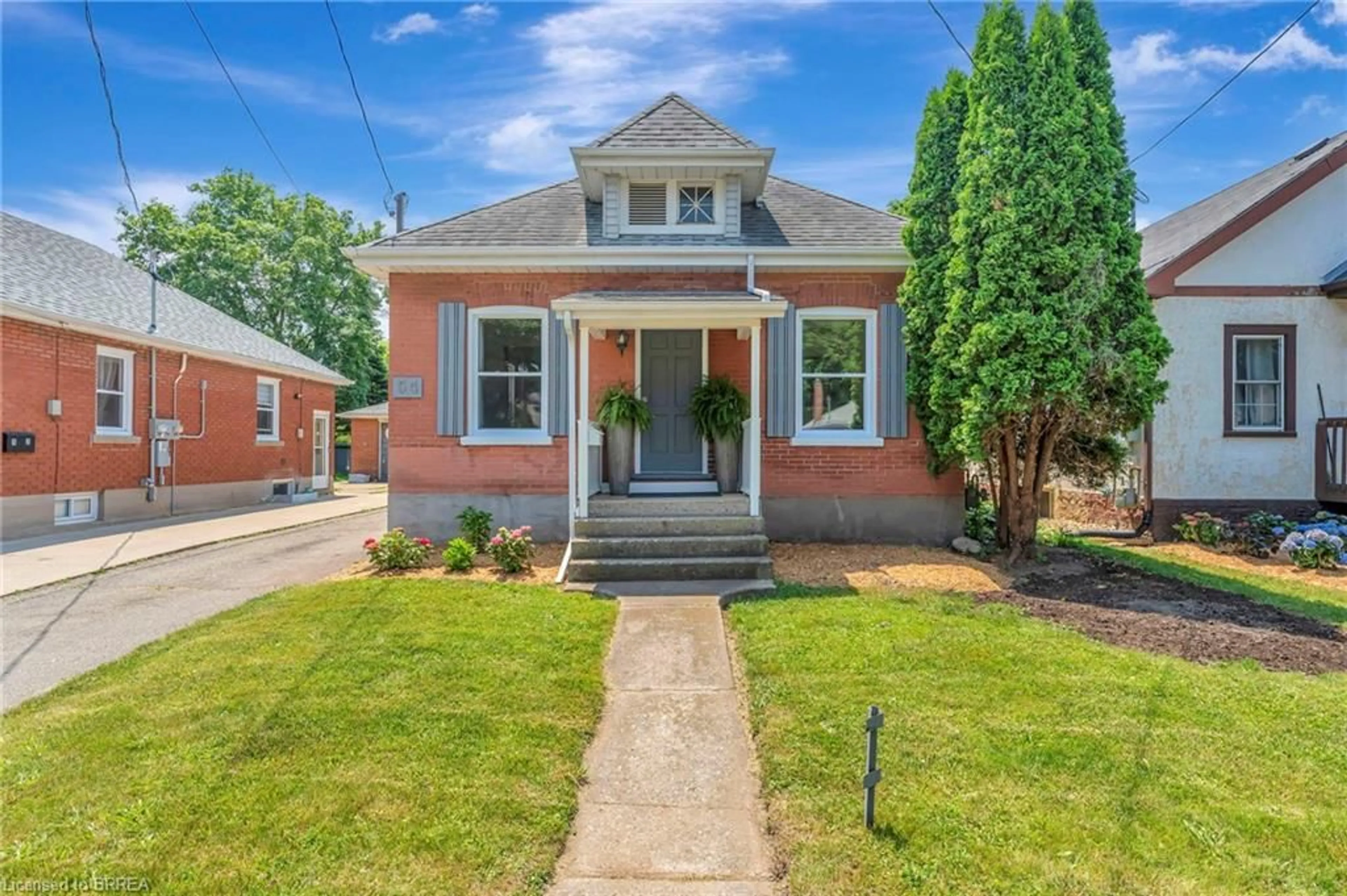 Home with brick exterior material, street for 54 Burwell St, Brantford Ontario N3T 4T7