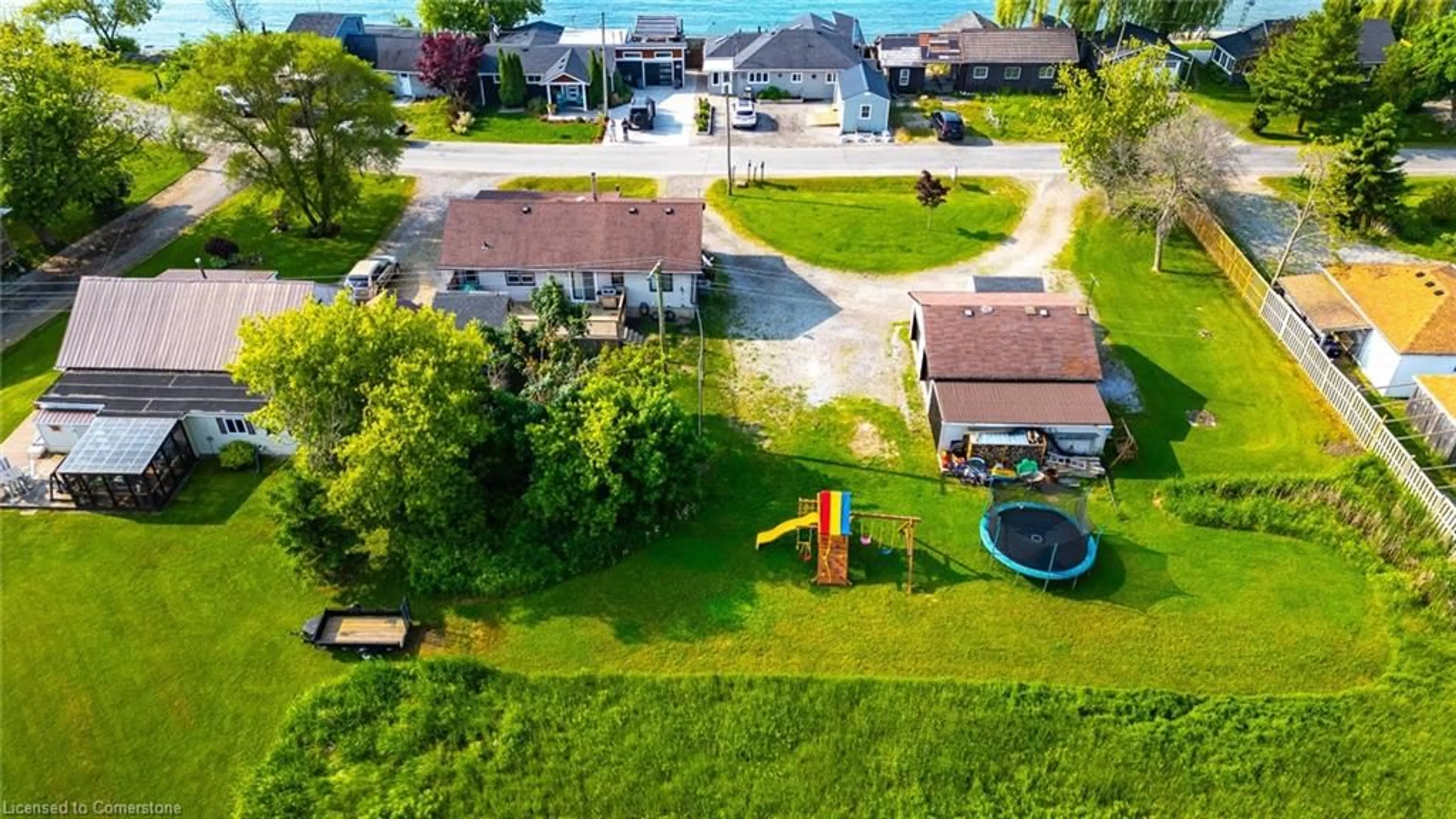 A pic from outside/outdoor area/front of a property/back of a property/a pic from drone, street for 1199 Lakeshore Rd, Haldimand County Ontario N0A 1P0