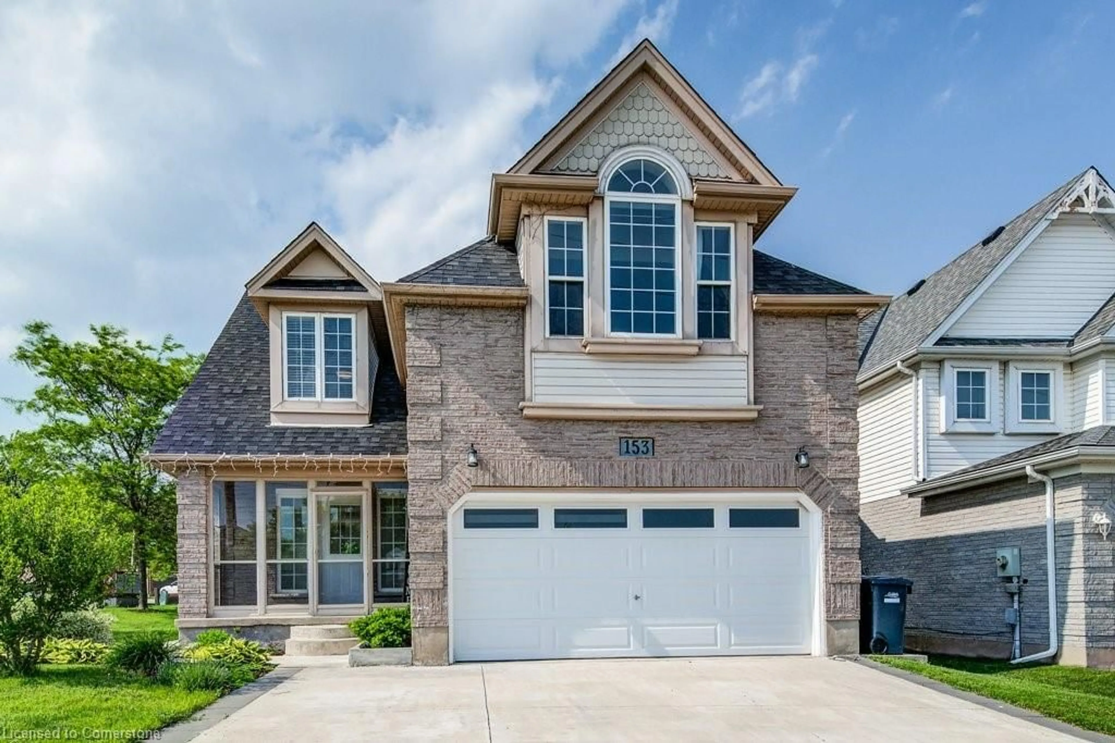 Home with brick exterior material, street for 153 Starwood Dr, Guelph Ontario N1E 7G7