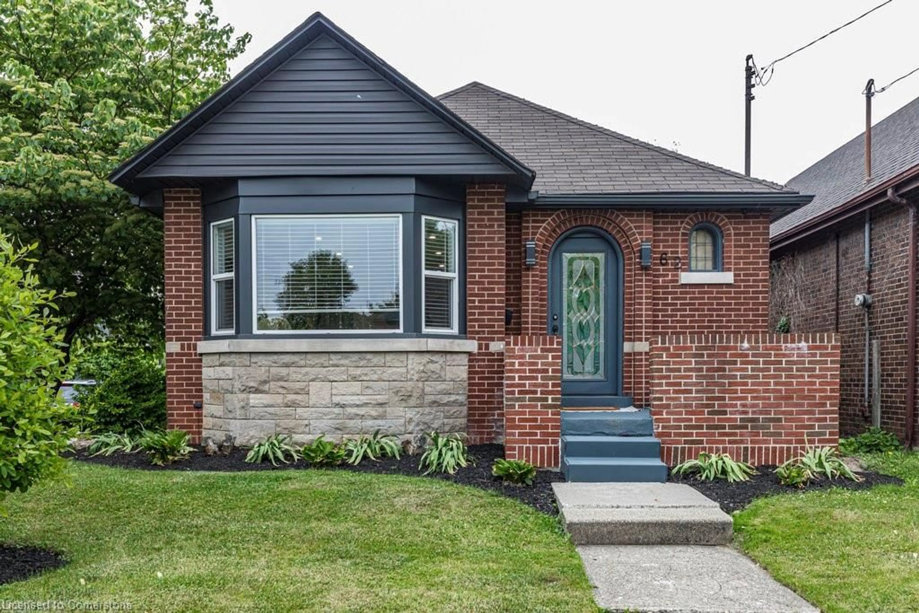 Home with brick exterior material, street for 62 Weir St, Hamilton Ontario L8H 5E6
