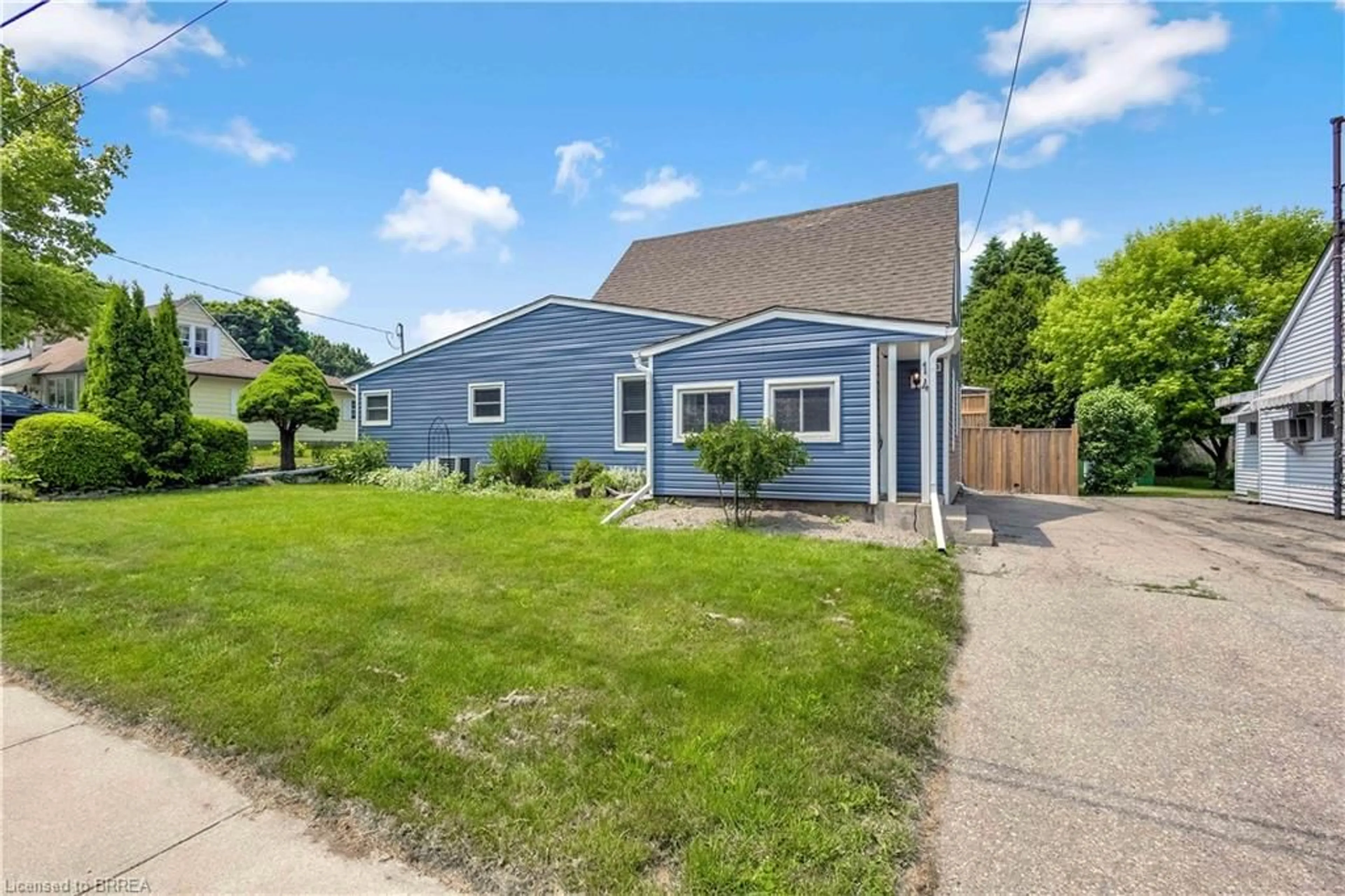 Home with vinyl exterior material, street for 14 Barker St, Paris Ontario N3L 2H5