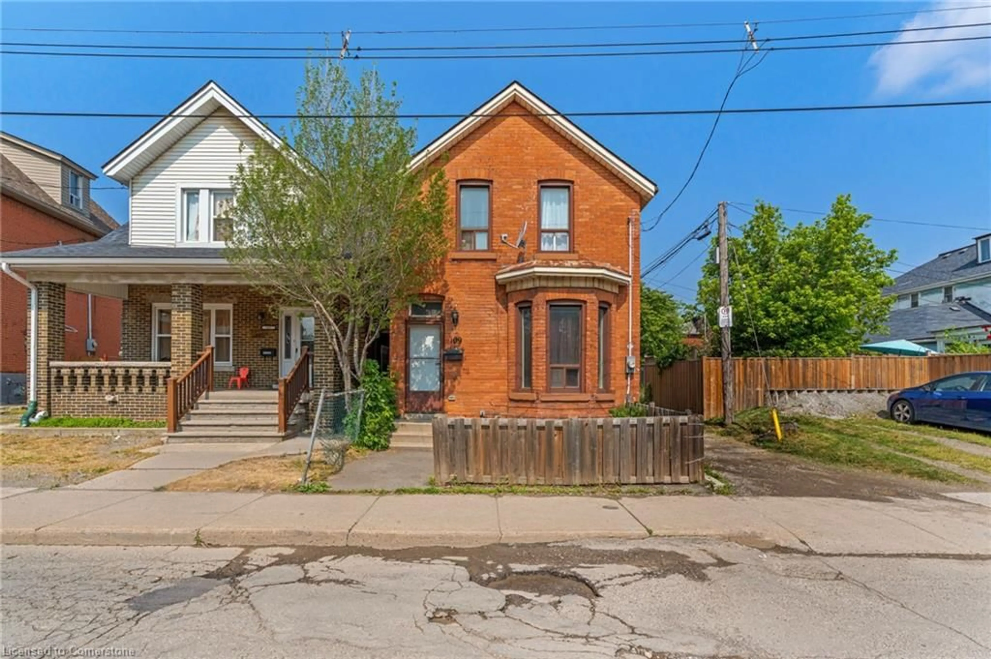 Home with brick exterior material, street for 109 Sanford Ave, Hamilton Ontario L8L 5Z1