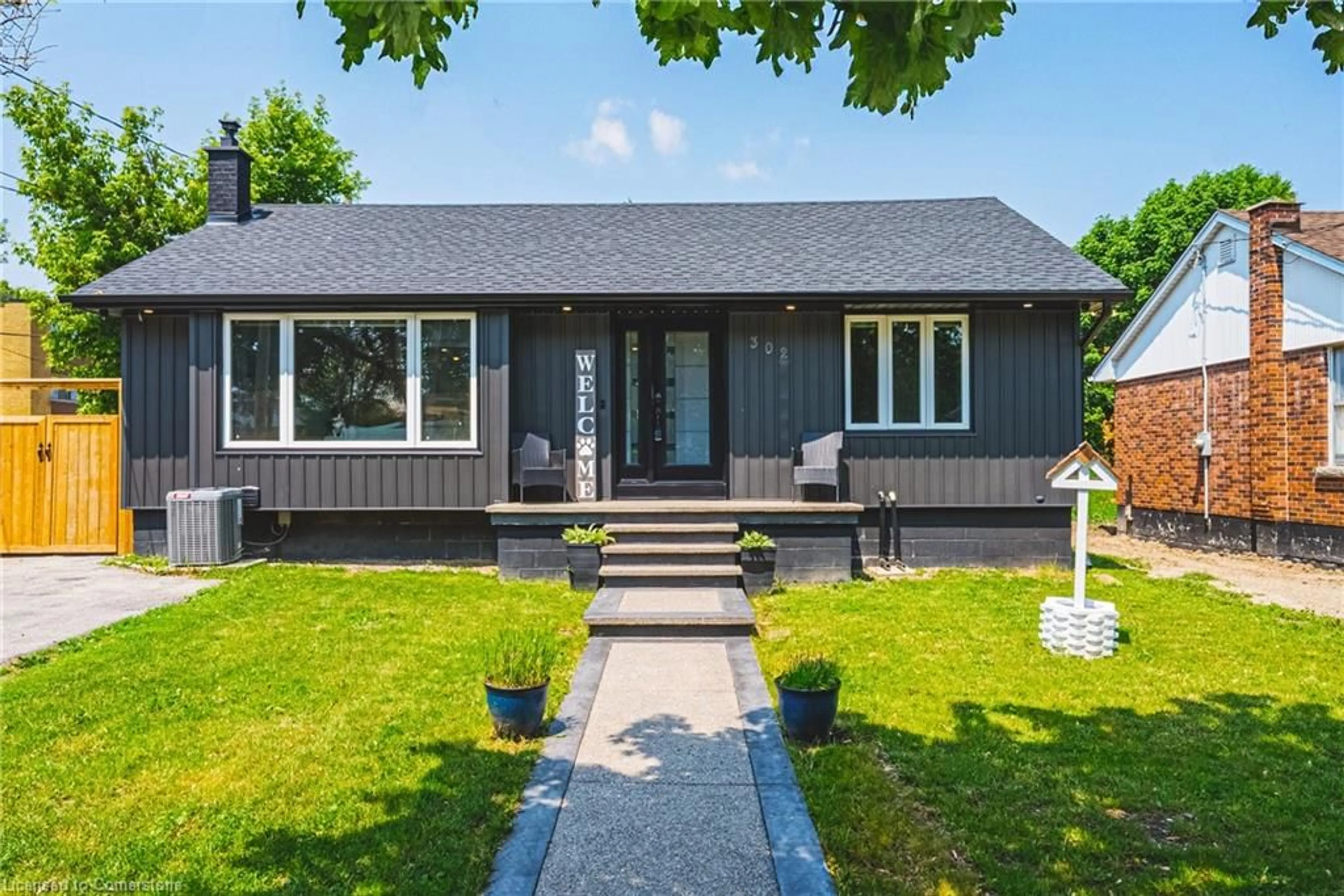 Home with vinyl exterior material, street for 302 East 43rd St, Hamilton Ontario L8T 3C7