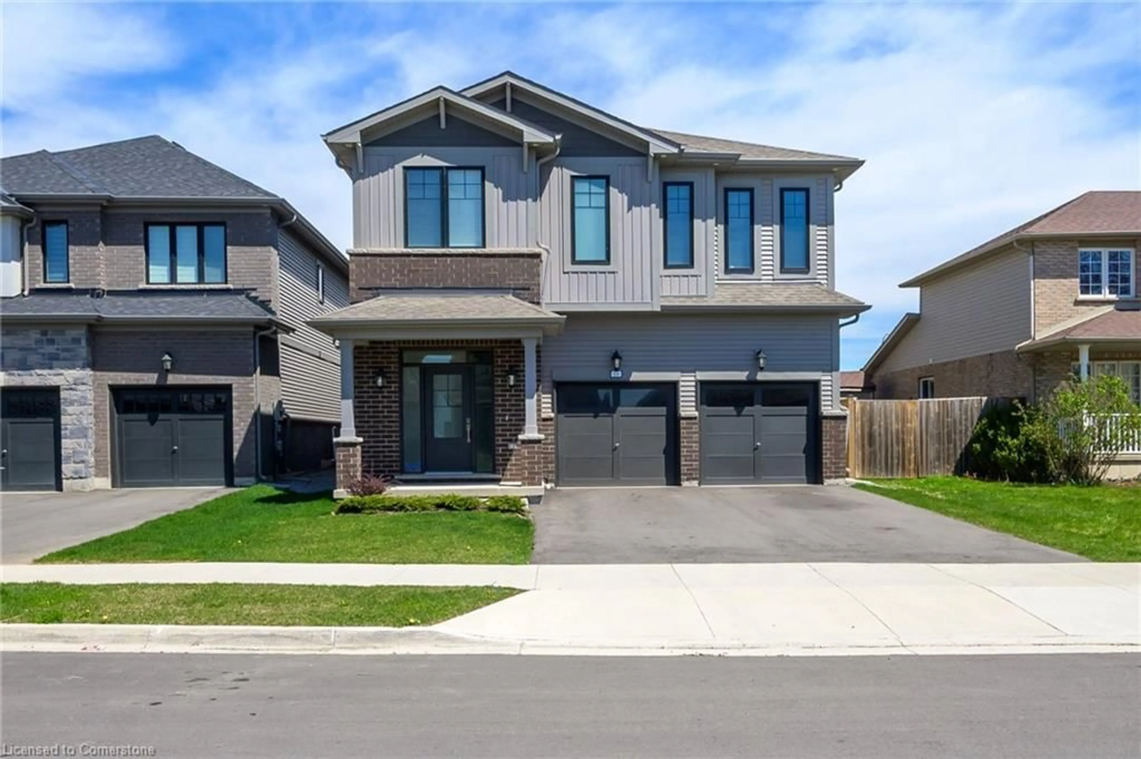 Home with brick exterior material, street for 64 Spitfire Dr, Hamilton Ontario L0R 1W0
