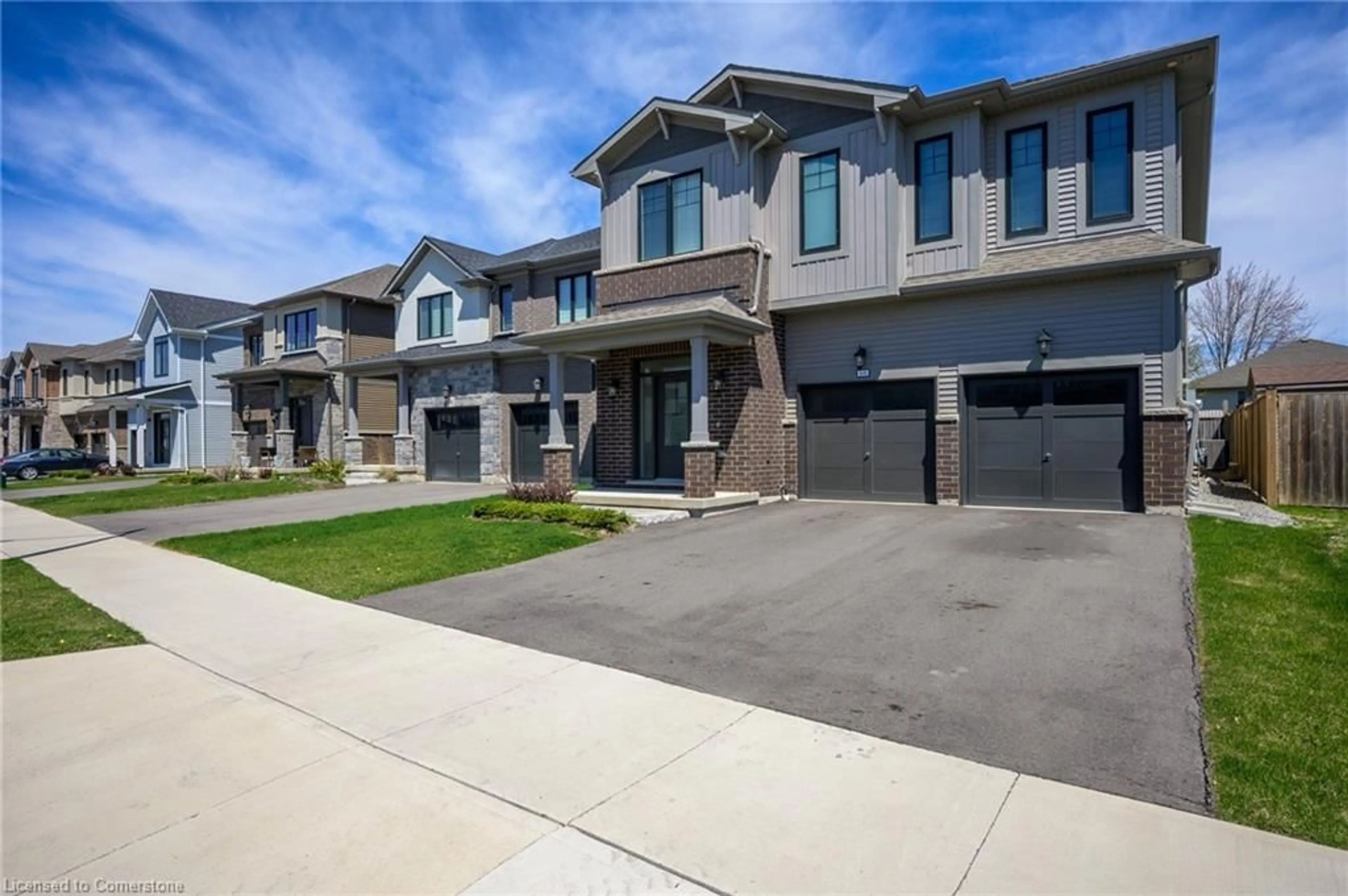 Home with brick exterior material, street for 64 Spitfire Dr, Hamilton Ontario L0R 1W0