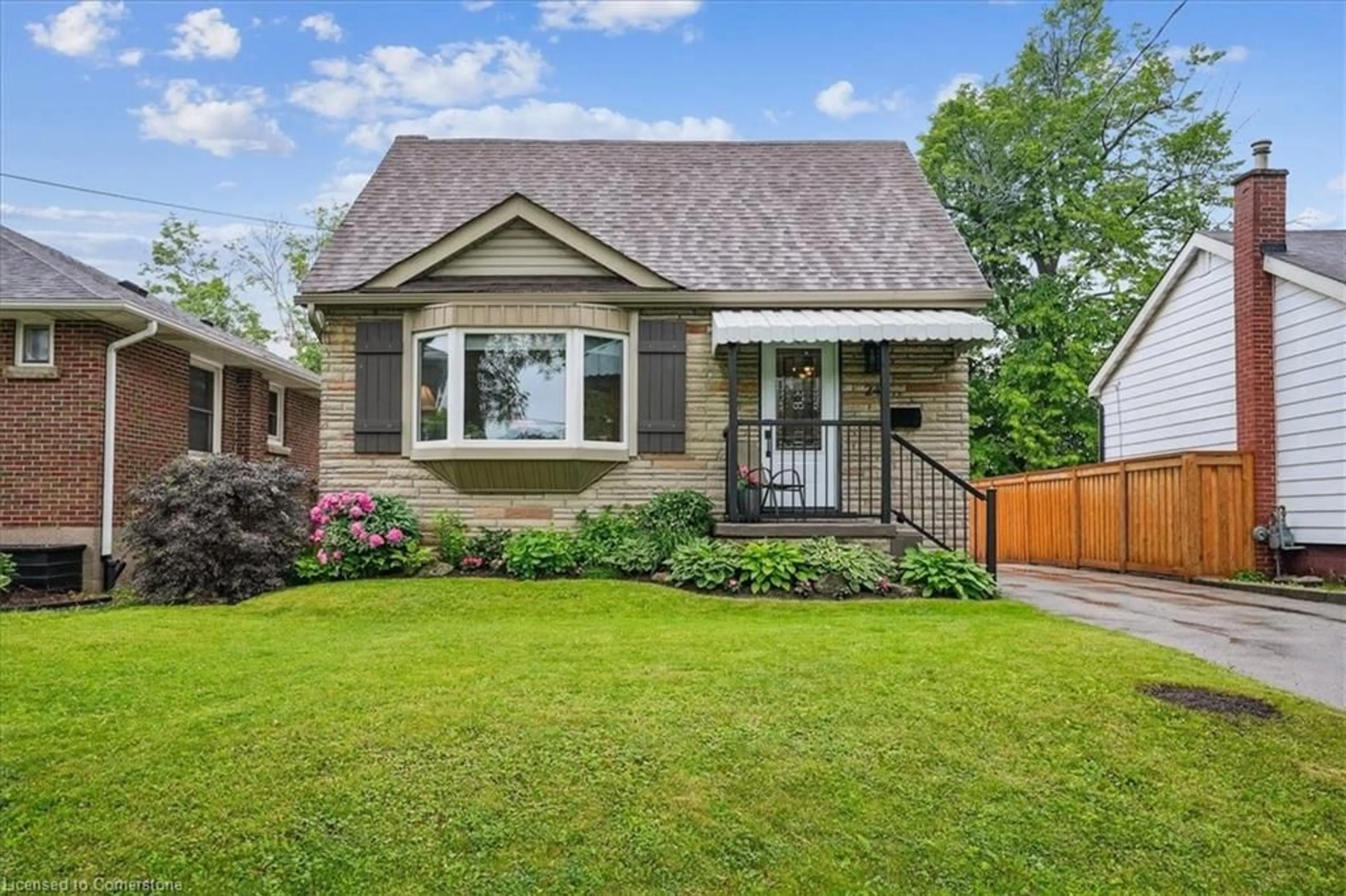 Home with brick exterior material, street for 246 East 43rd St, Hamilton Ontario L8T 3C5