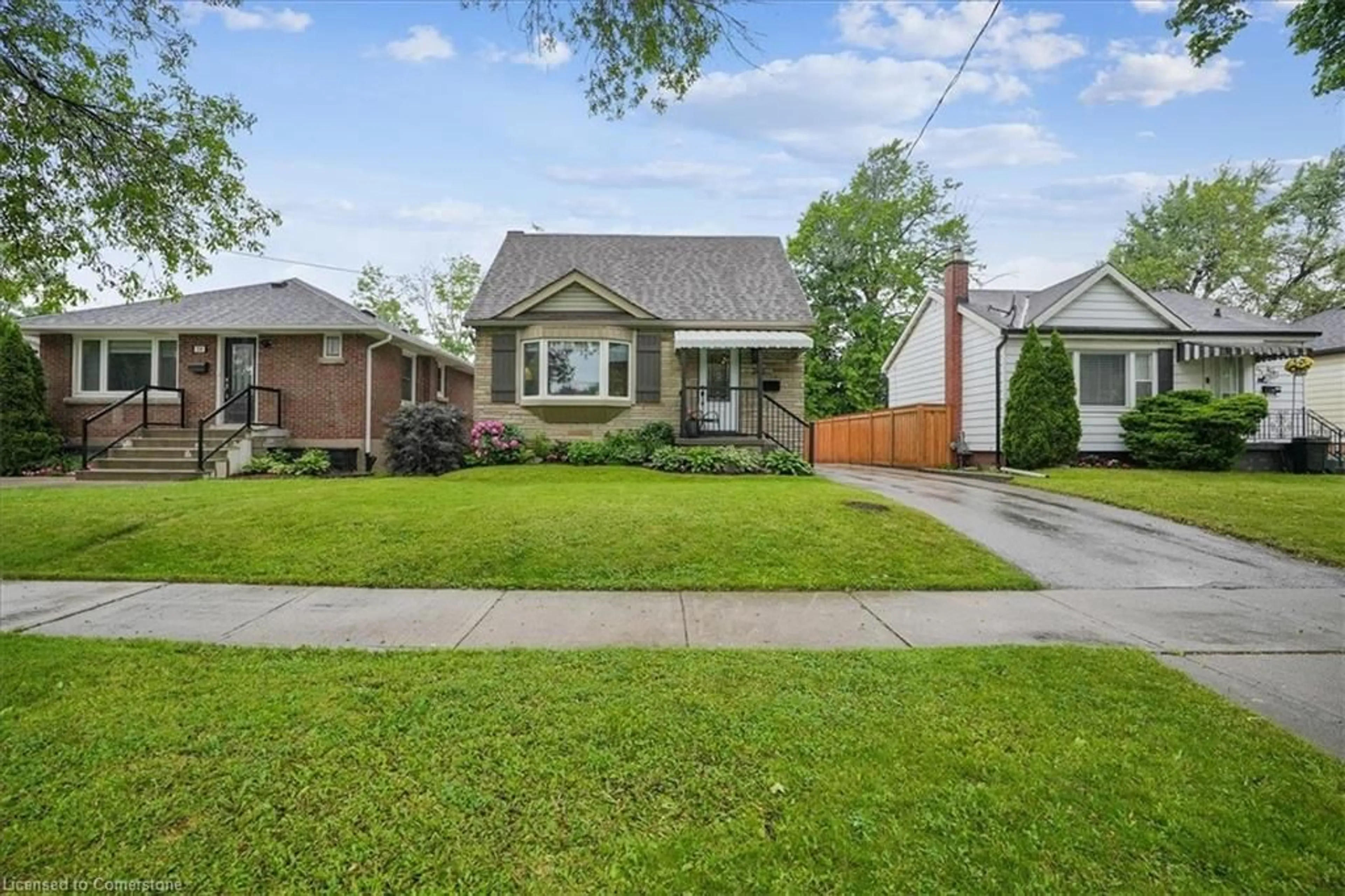 Home with brick exterior material, street for 246 East 43rd St, Hamilton Ontario L8T 3C5