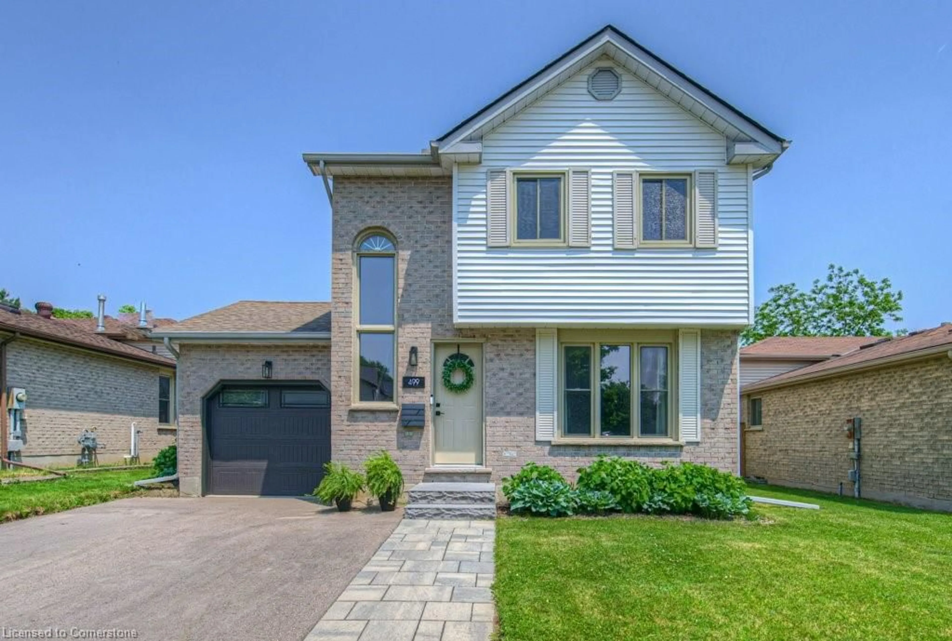 Home with brick exterior material, street for 499 Rosemeadow Cres, Waterloo Ontario N2T 2A3