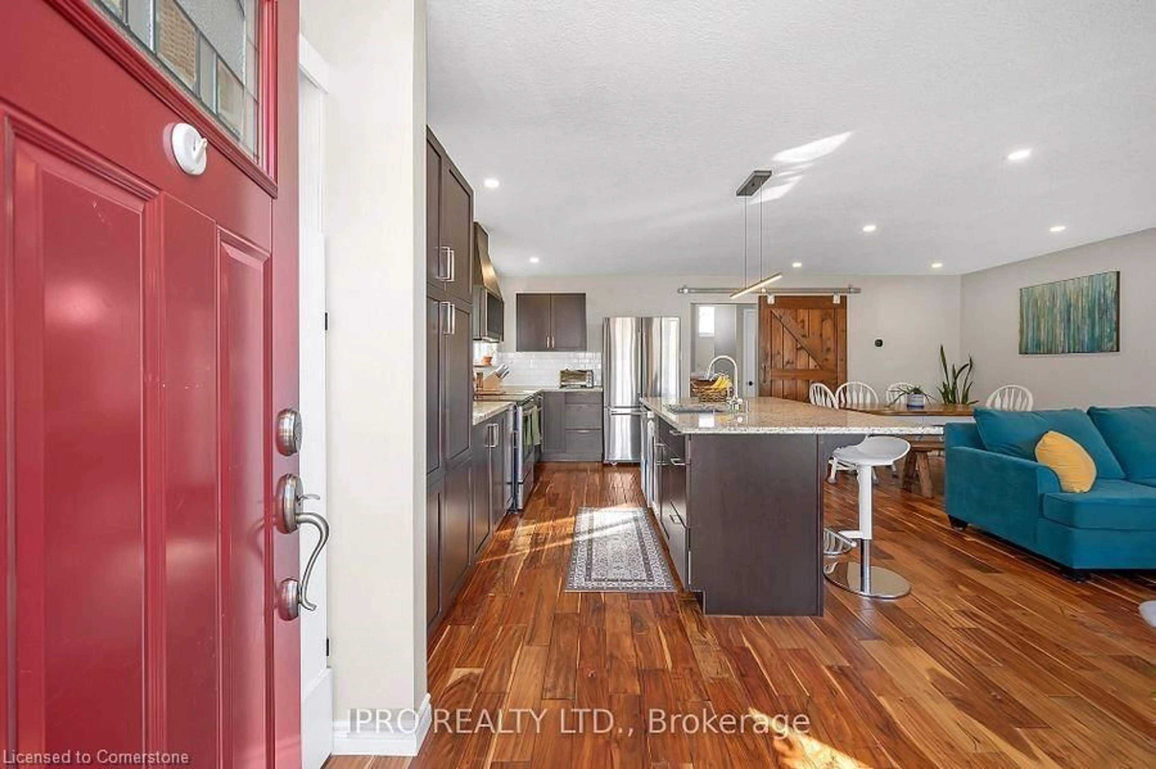 Open concept kitchen, wood/laminate floor for 64 Hahn Ave, Cambridge Ontario N3C 2X9