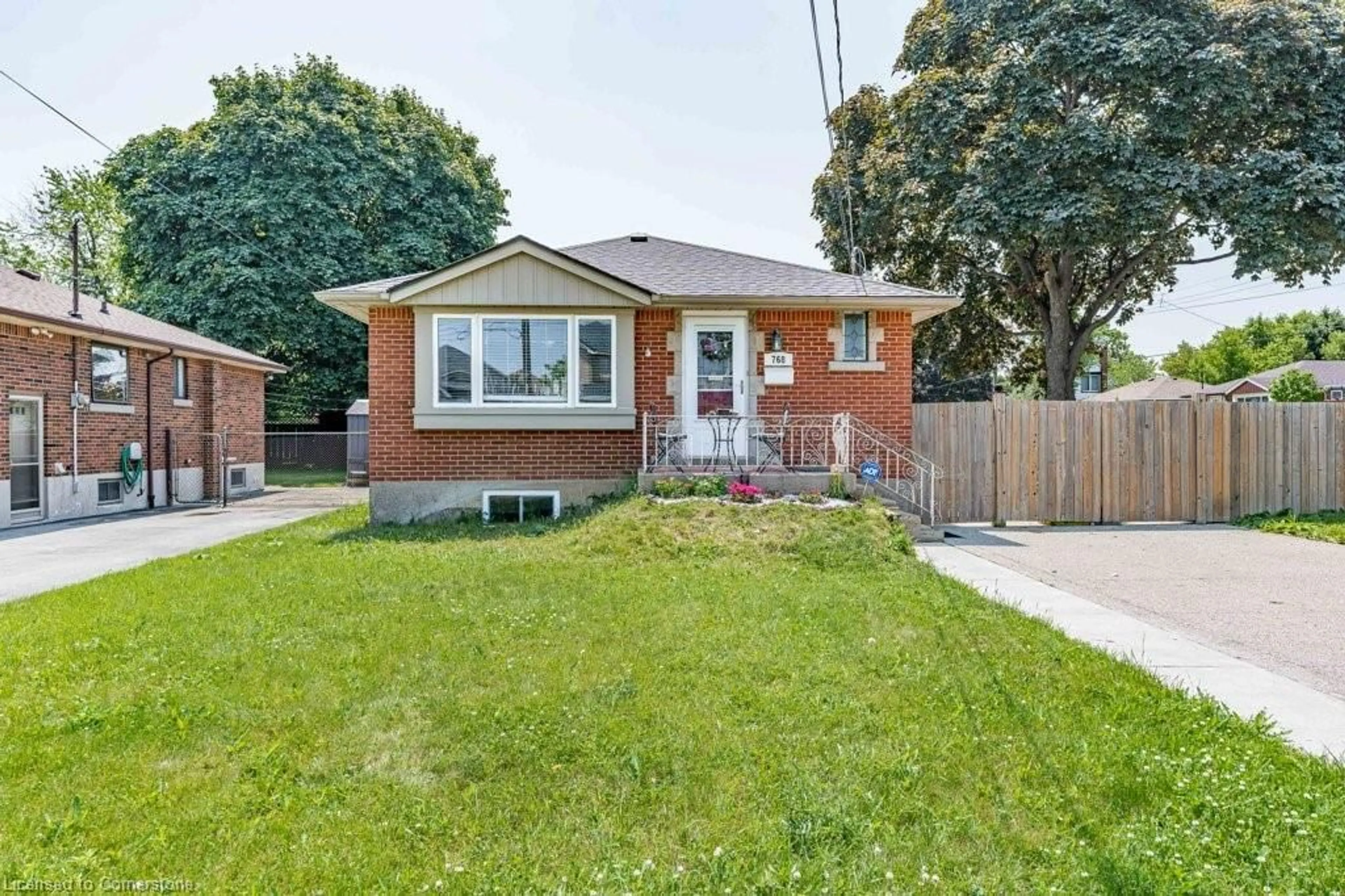Home with brick exterior material, street for 768 Tenth Ave, Hamilton Ontario L8T 2G3
