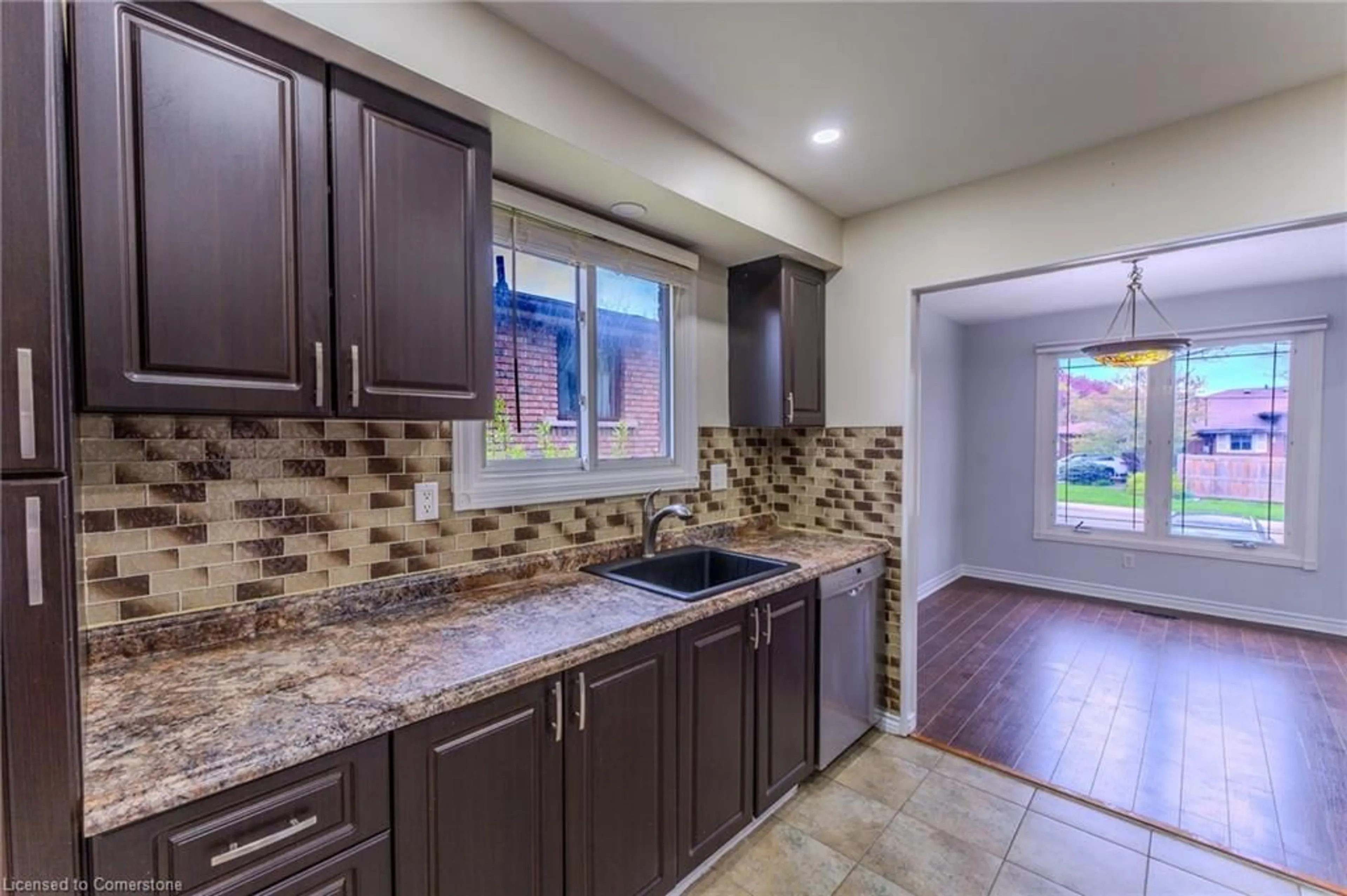 Open concept kitchen, ceramic/tile floor for 17 Taymall St, Hamilton Ontario L8W 1Z7