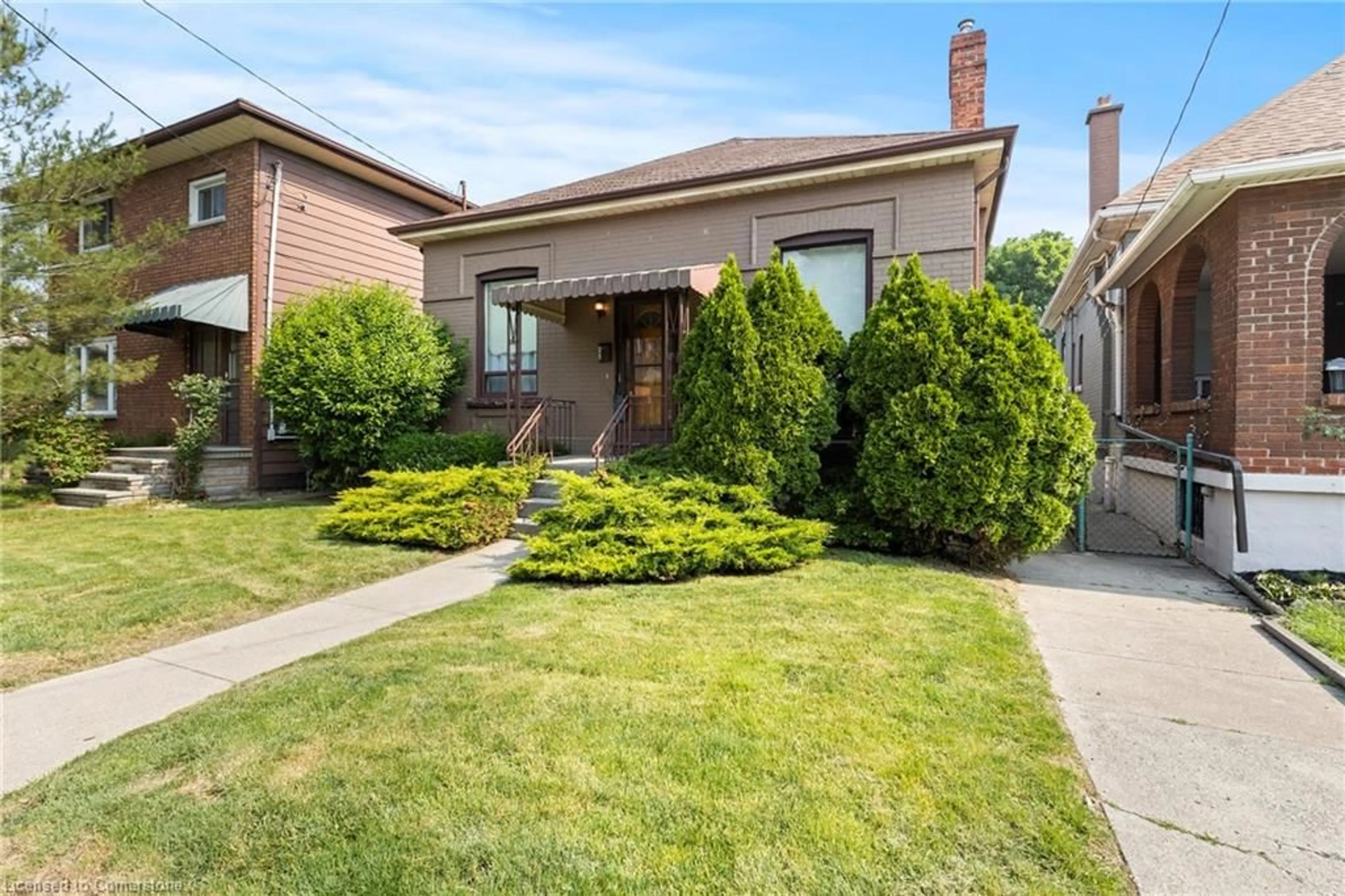 Home with brick exterior material, street for 441 King William St, Hamilton Ontario L8L 1R1