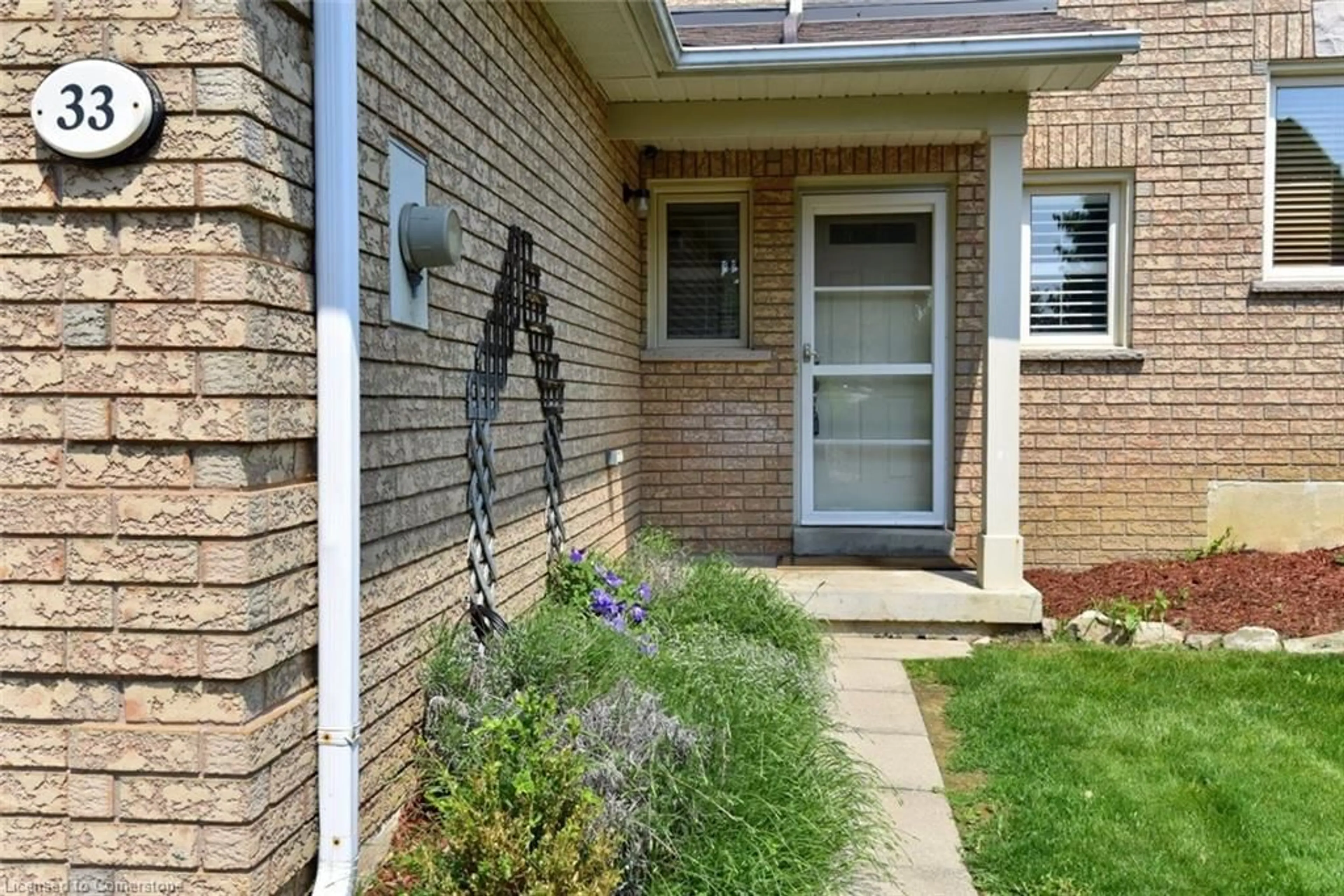 Home with brick exterior material, street for 11 Pirie Dr #33, Hamilton Ontario L9H 6Z6