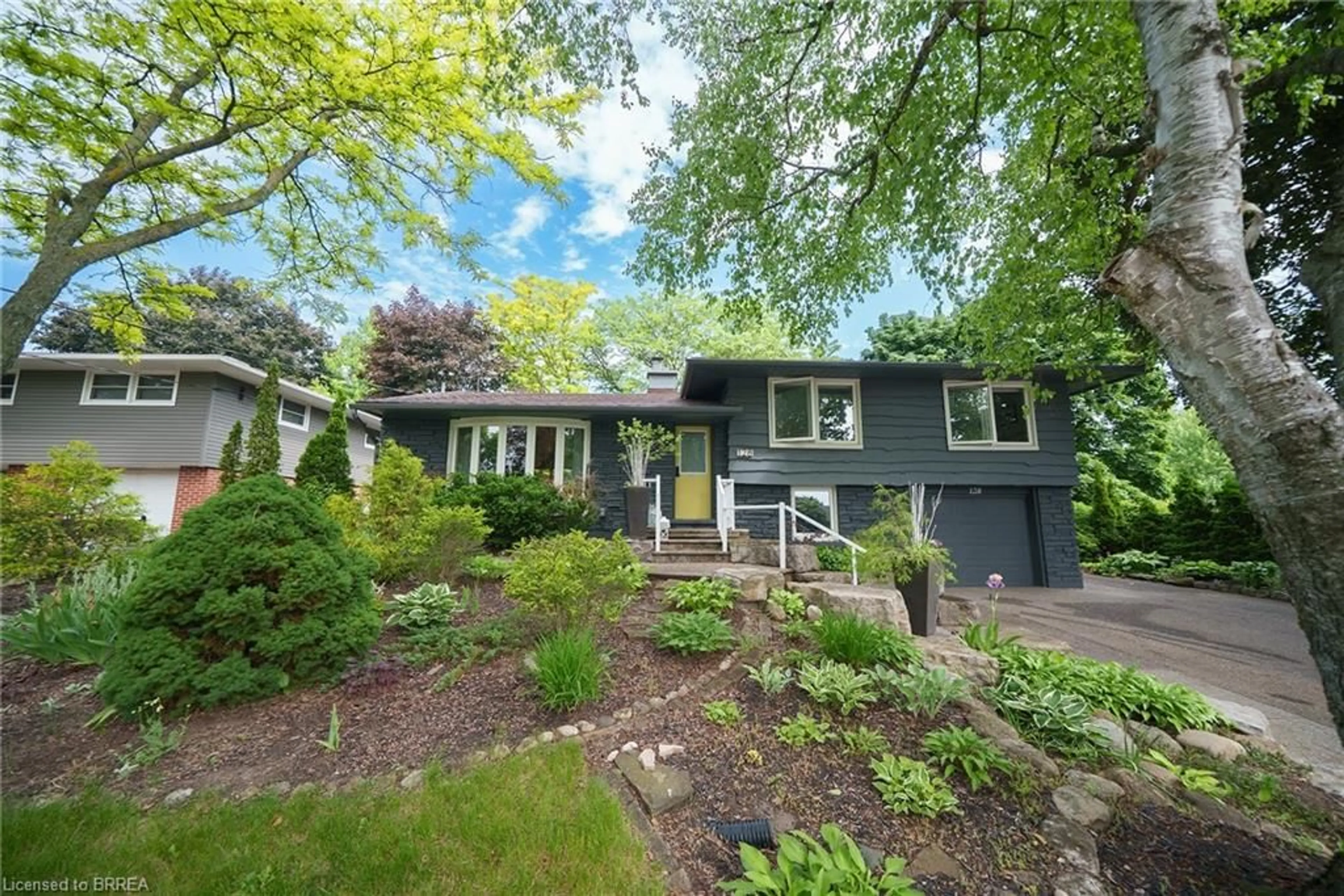 Home with vinyl exterior material, street for 128 Blueridge Ave, Kitchener Ontario N2M 4E1