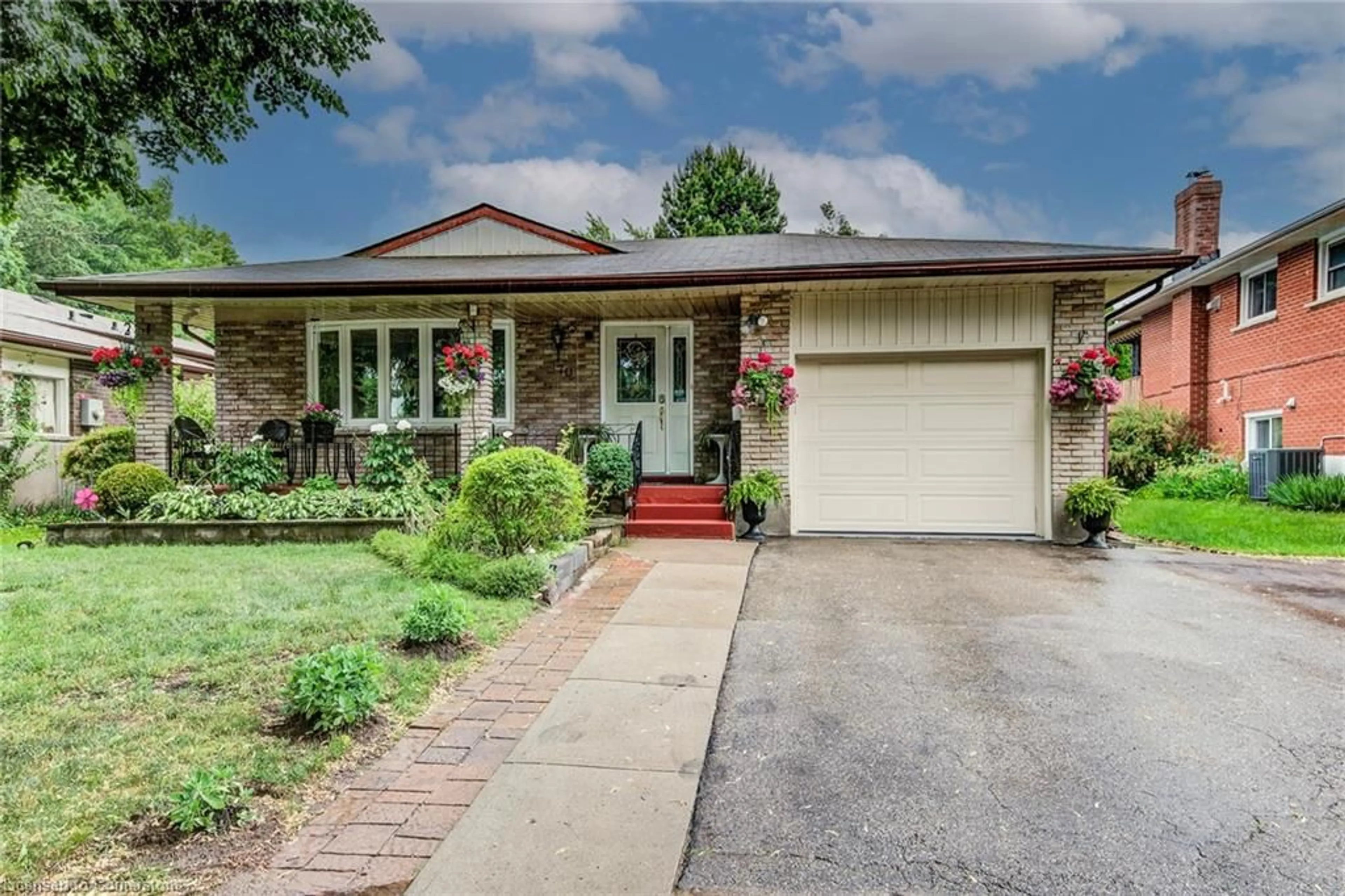 Home with brick exterior material, street for 170 Martinglen Cres, Kitchener Ontario N2E 2A2