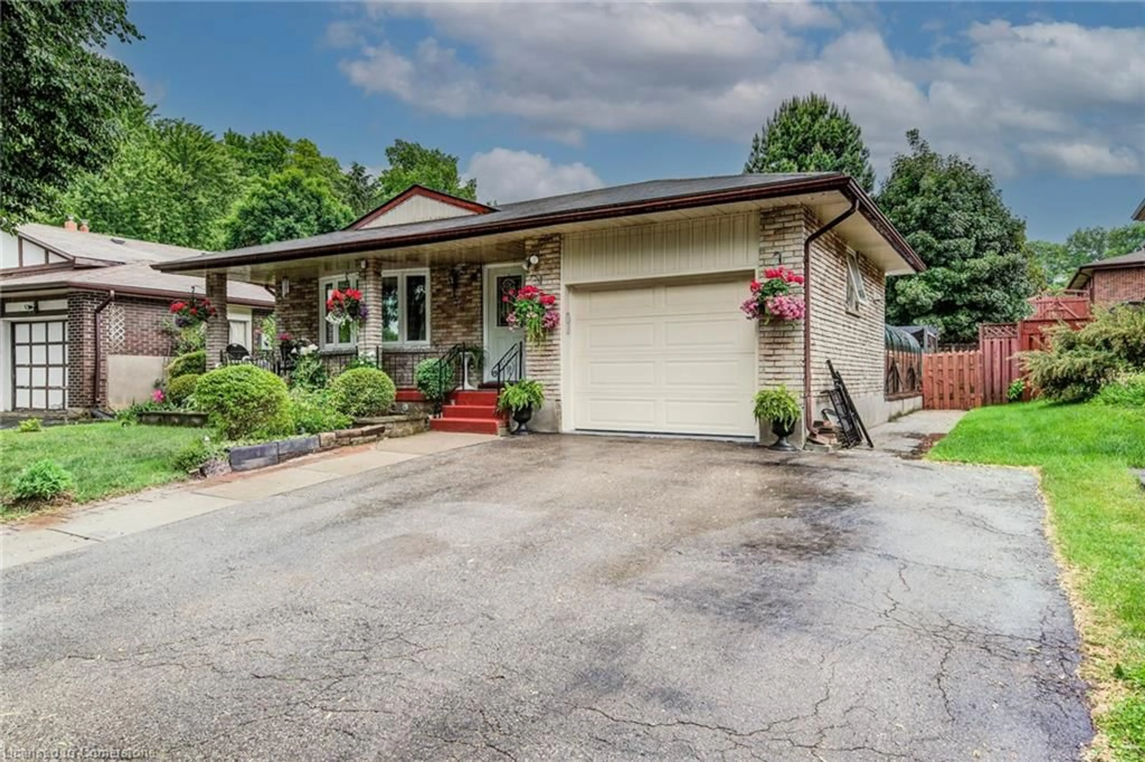 Home with brick exterior material, street for 170 Martinglen Cres, Kitchener Ontario N2E 2A2