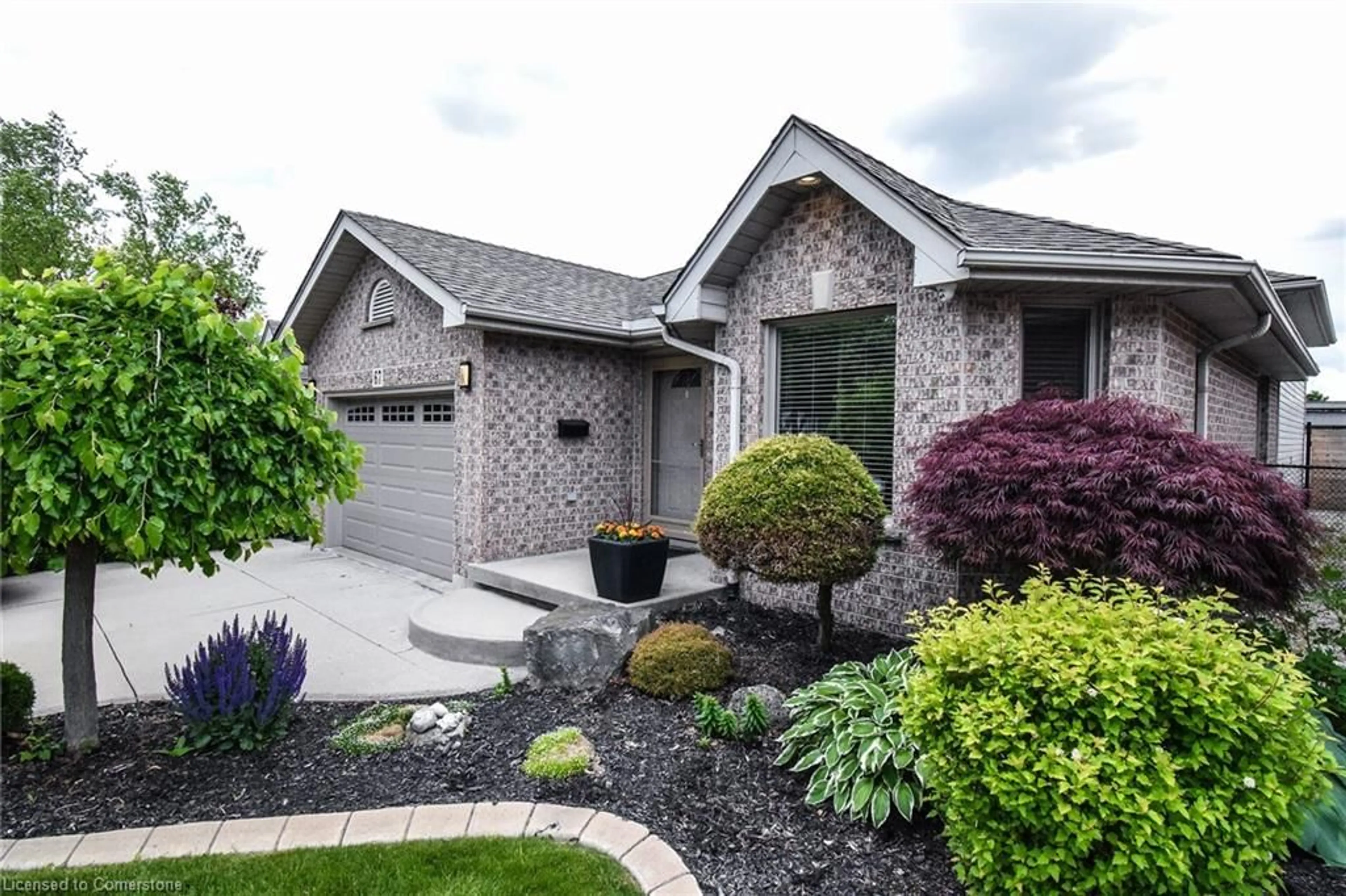 Home with brick exterior material, street for 67 Lawnhurst Dr, Hamilton Ontario L8V 4N9