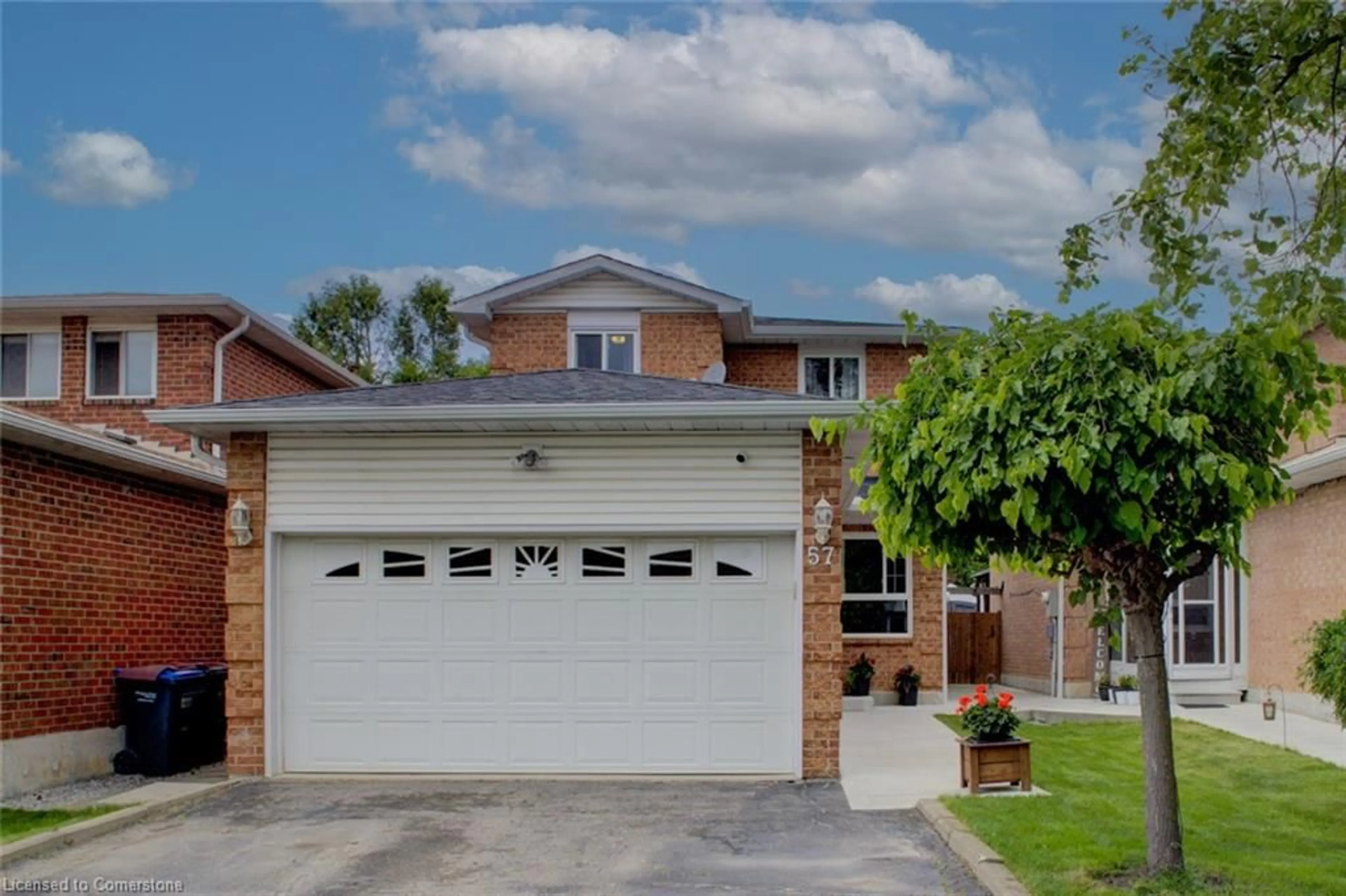 Home with brick exterior material, street for 57 Ecclestone Dr, Brampton Ontario L6X 3N2