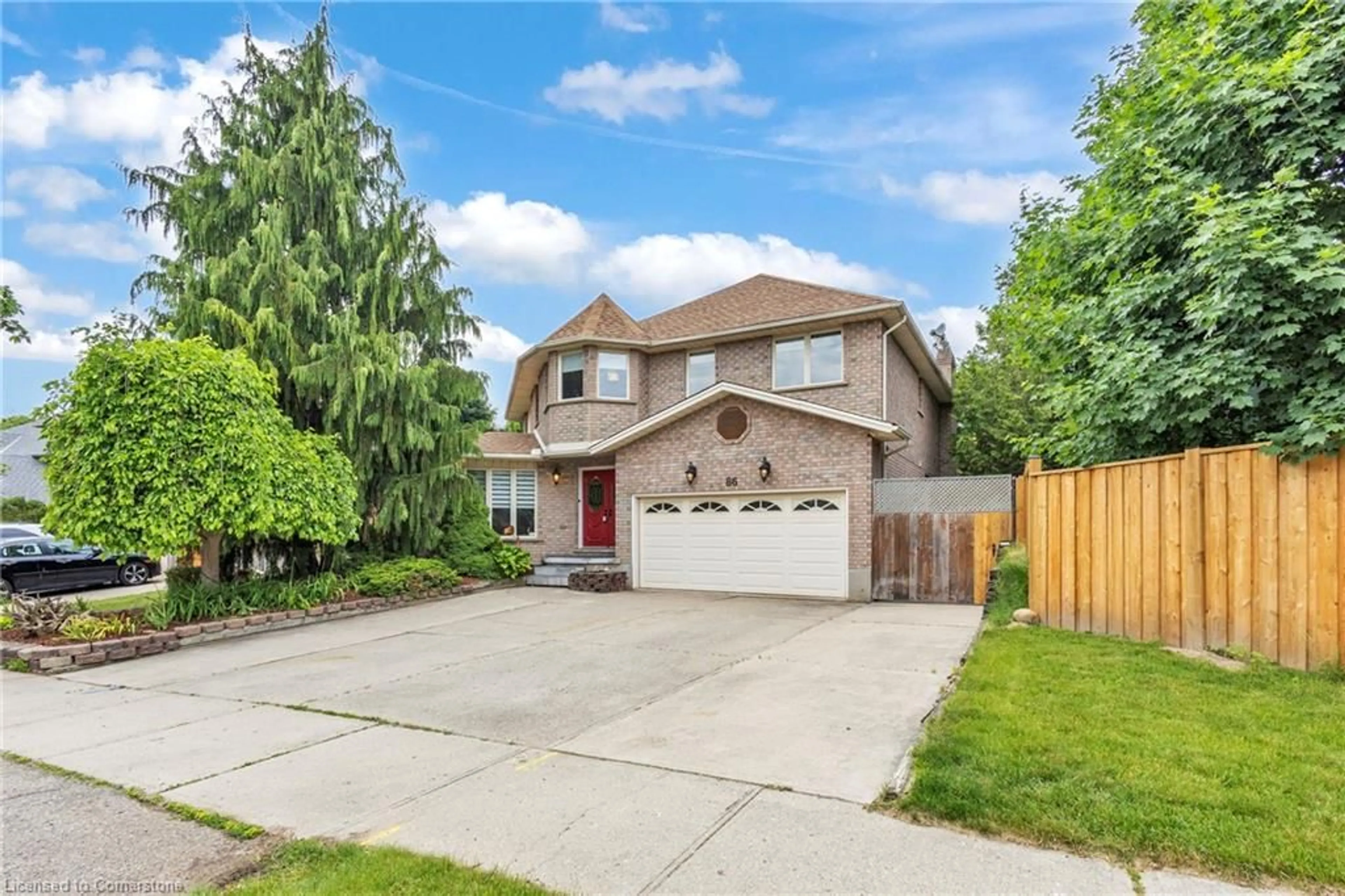 Home with brick exterior material, street for 86 Corfield Dr, Kitchener Ontario N2A 3X2