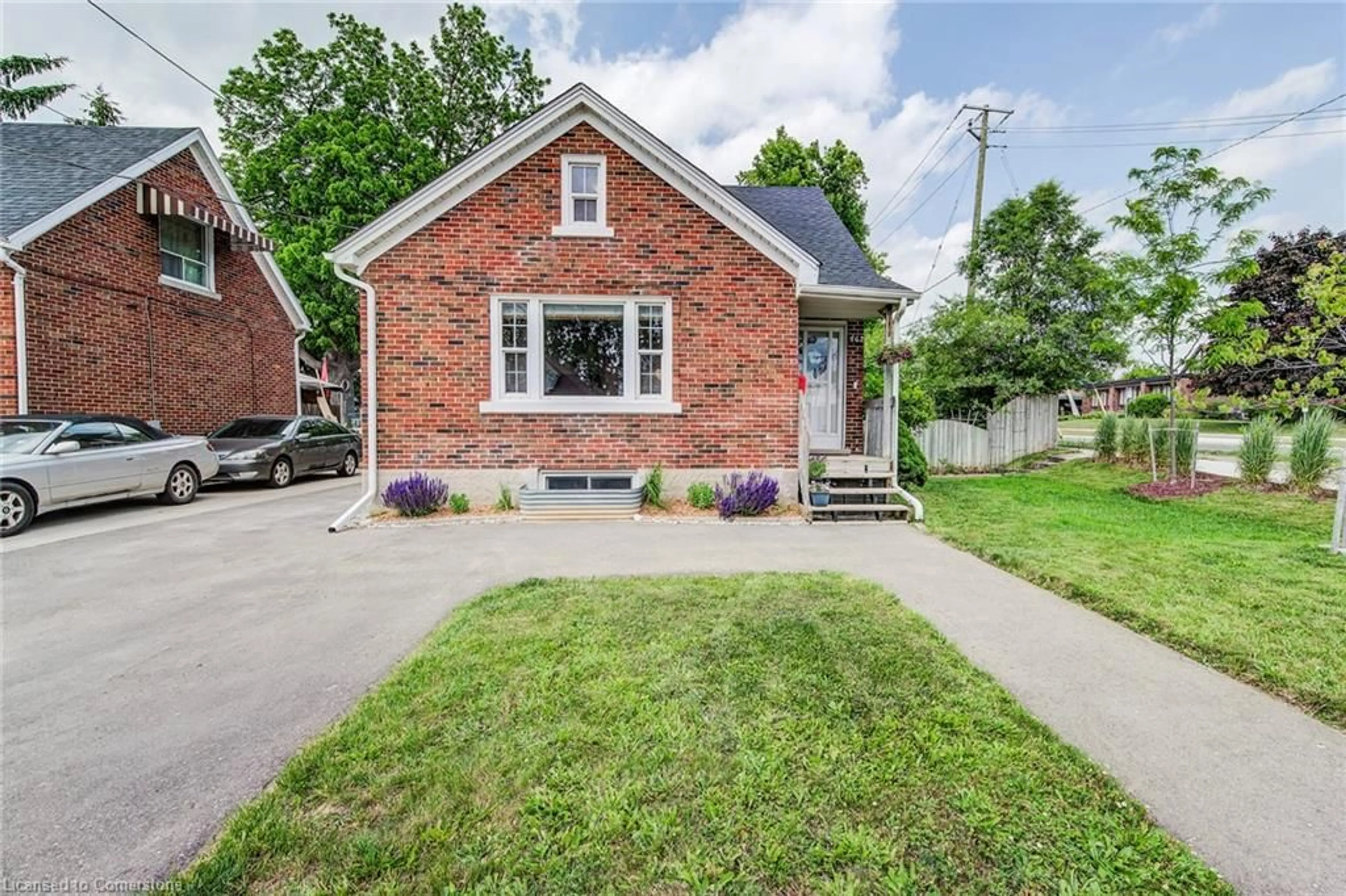 Home with brick exterior material, street for 462 Stirling Ave, Kitchener Ontario N2M 3J2