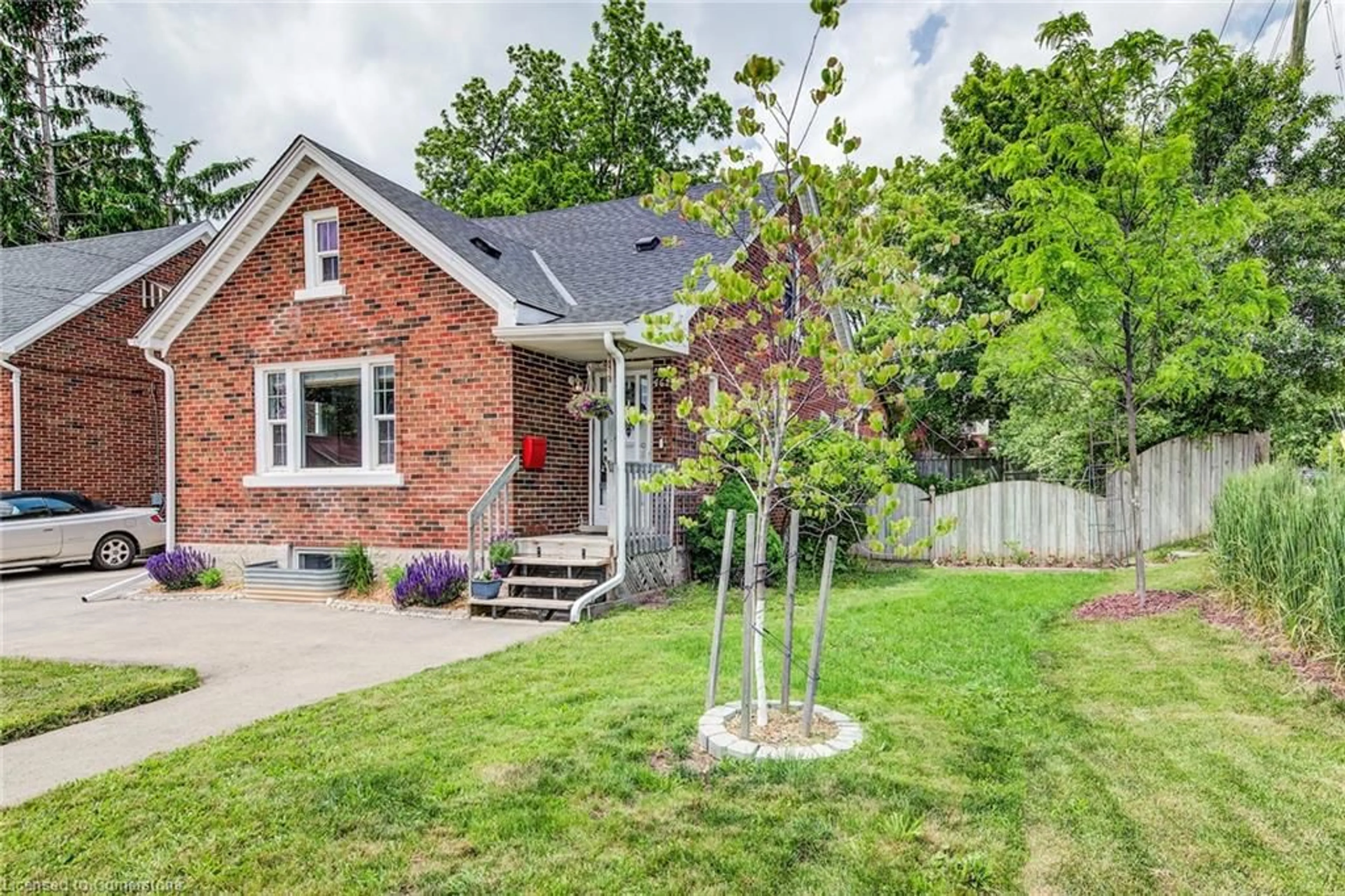 Home with brick exterior material, street for 462 Stirling Ave, Kitchener Ontario N2M 3J2